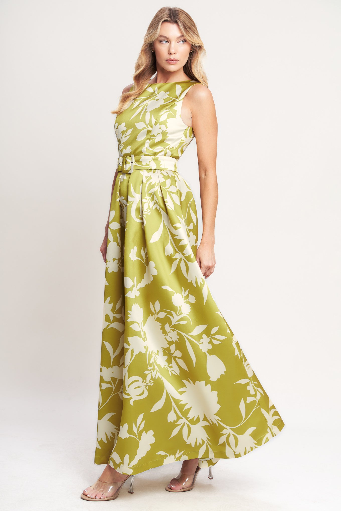 A printed woven maxi dress featuring round neckline, sleeveless, self belt, full skirt, open back with back neck button and zipper closure

Details:

Self : 100% Polyester
Lining : 100% Polyester

Size &amp; Fit

- Model is 5`8" And Wearing Size Small
- Measurements Taken From Size Small
- Approx. Length: 60"