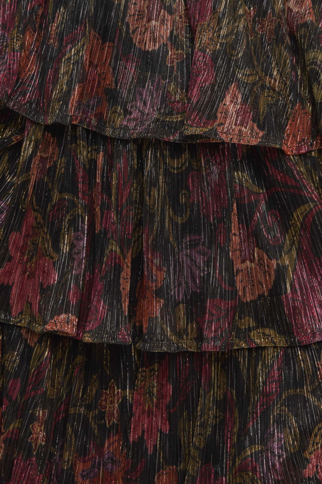 A woven micro-pleated maxi dress featuring surplice neckline, sleeveless, smocked waistband and layered skirt