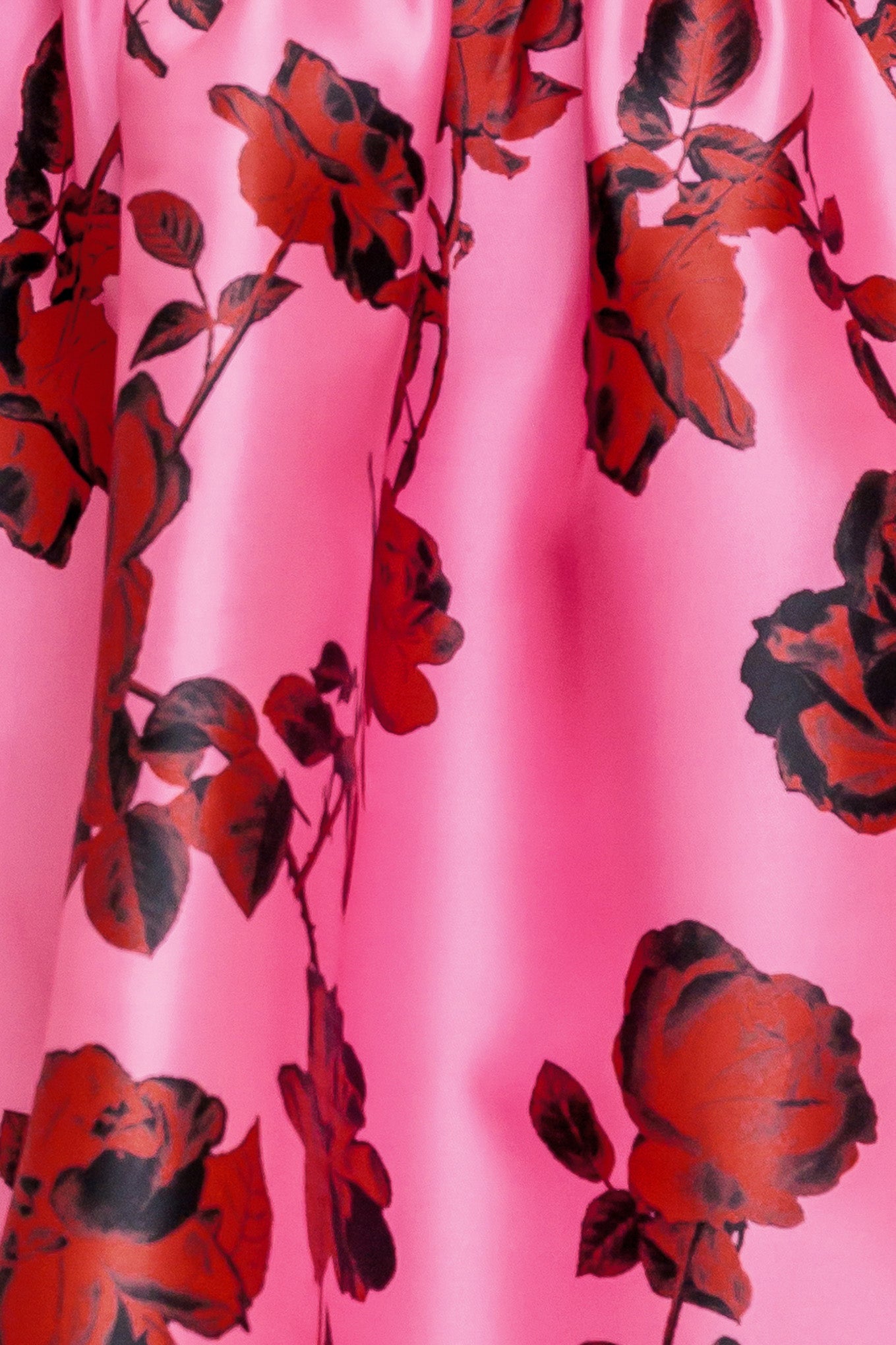 This strapless mini dress showcases a pink floral pattern on woven fabric, designed with a full skirt and secured by a back zipper closure.