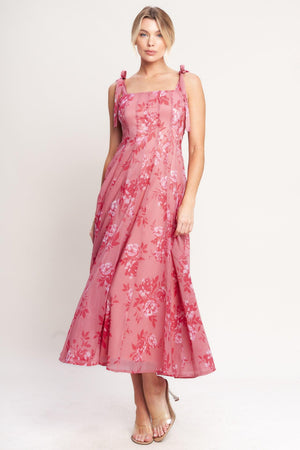 A printed woven midi dress featuring square neckline, shoulder tie, circle skirt and back zipper closure

Details:

Self: 100% Polyester

Lining: 100% Polyester

Size & Fit

-Model is 5`8" And Wearing Size Small
-Measurements Taken From Size Small
-Approx. Length: 53"