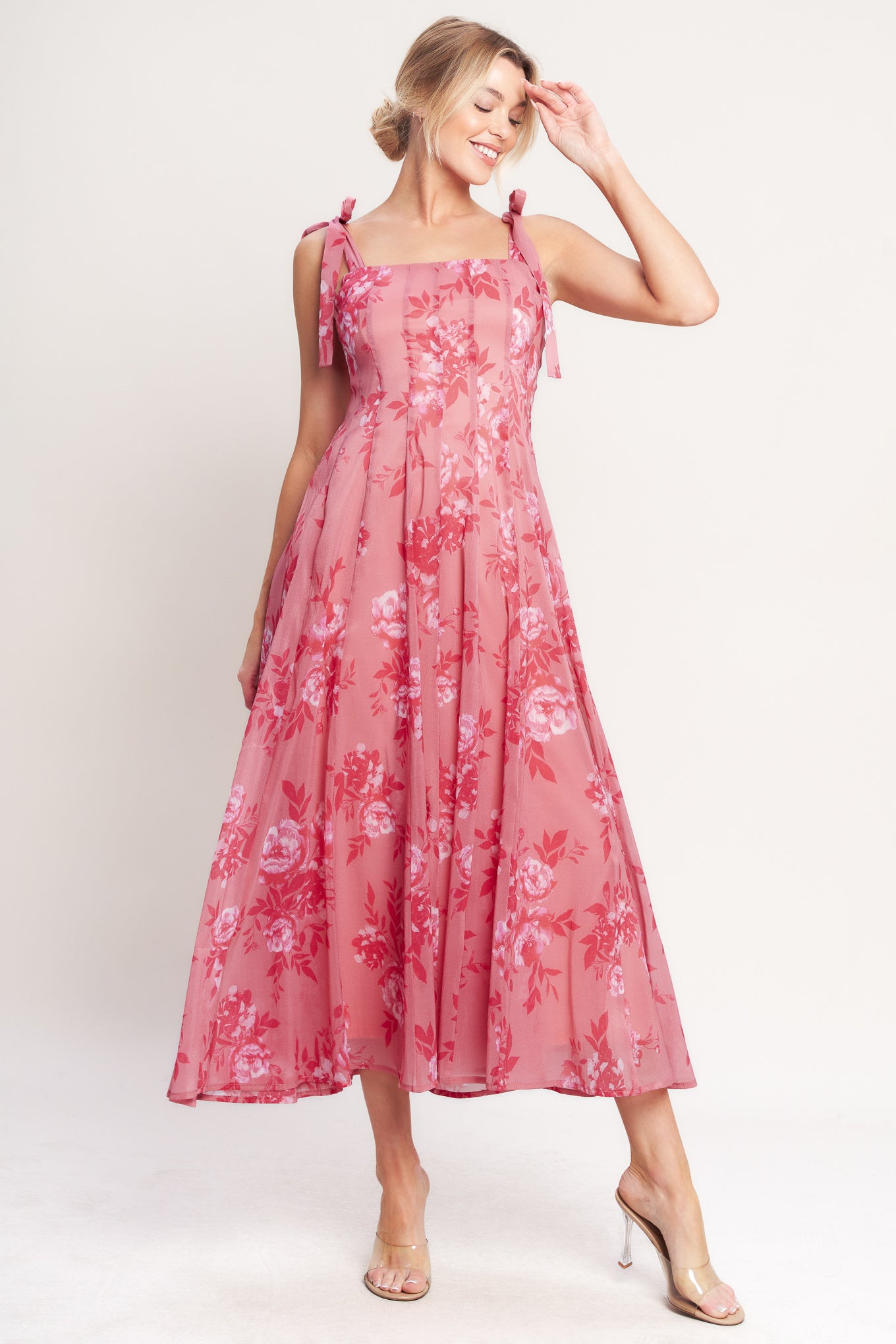 A printed woven midi dress featuring square neckline, shoulder tie, circle skirt and back zipper closure

Details:

Self: 100% Polyester

Lining: 100% Polyester

Size & Fit

-Model is 5`8" And Wearing Size Small
-Measurements Taken From Size Small
-Approx. Length: 53"