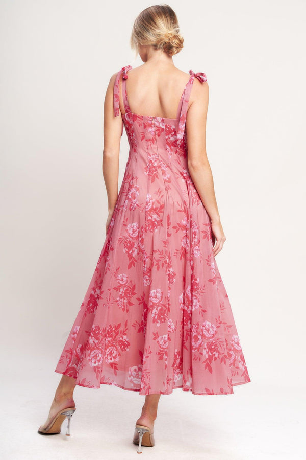 A printed woven midi dress featuring square neckline, shoulder tie, circle skirt and back zipper closure

Details:

Self: 100% Polyester

Lining: 100% Polyester

Size & Fit

-Model is 5`8" And Wearing Size Small
-Measurements Taken From Size Small
-Approx. Length: 53"