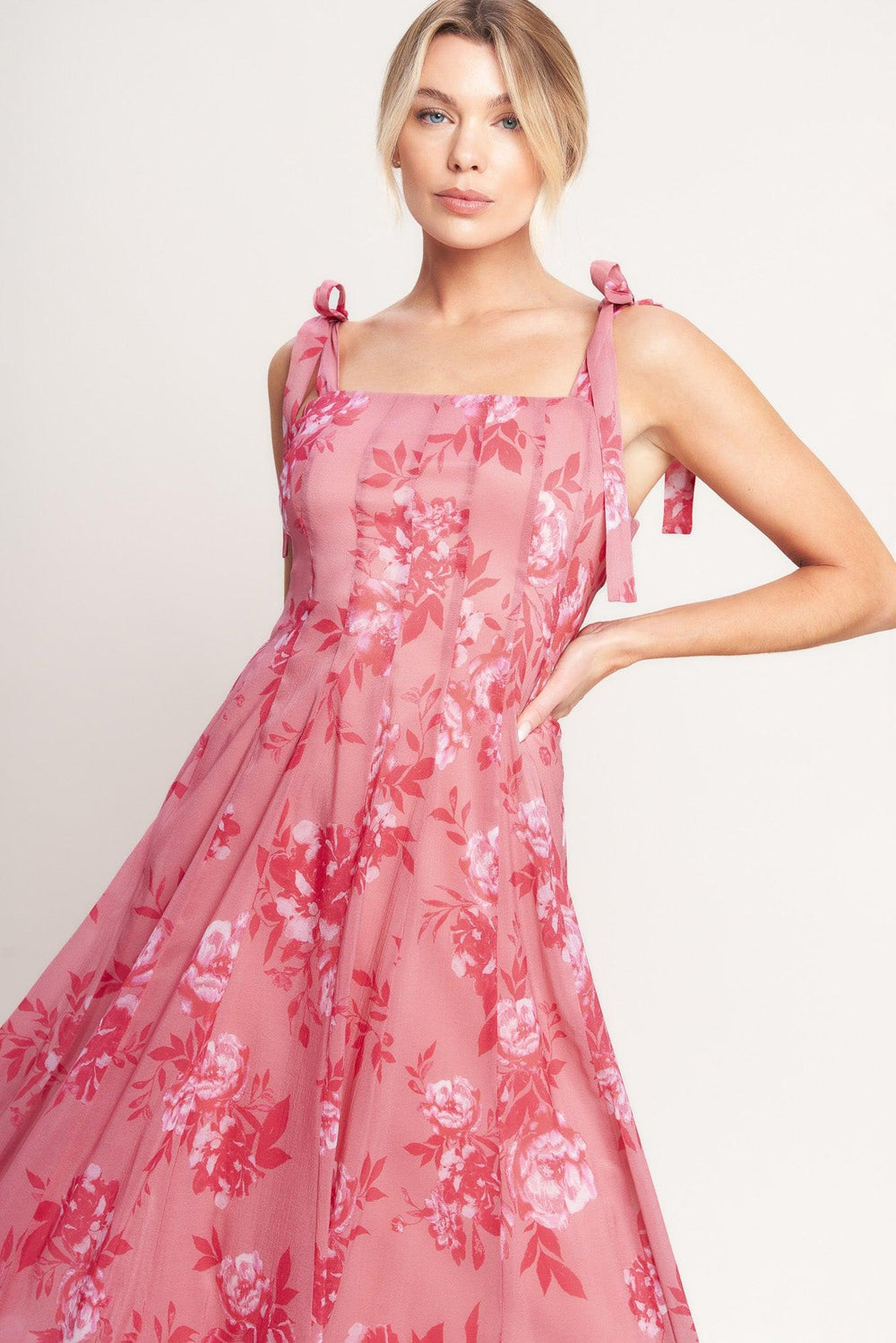 A printed woven midi dress featuring square neckline, shoulder tie, circle skirt and back zipper closure

Details:

Self: 100% Polyester

Lining: 100% Polyester

Size & Fit

-Model is 5`8" And Wearing Size Small
-Measurements Taken From Size Small
-Approx. Length: 53"