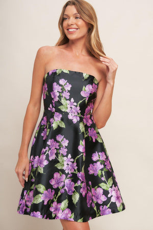 A printed woven mini dress featuring strapless, circle skirt and back zipper closure