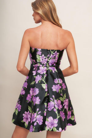 A printed woven mini dress featuring strapless, circle skirt and back zipper closure
