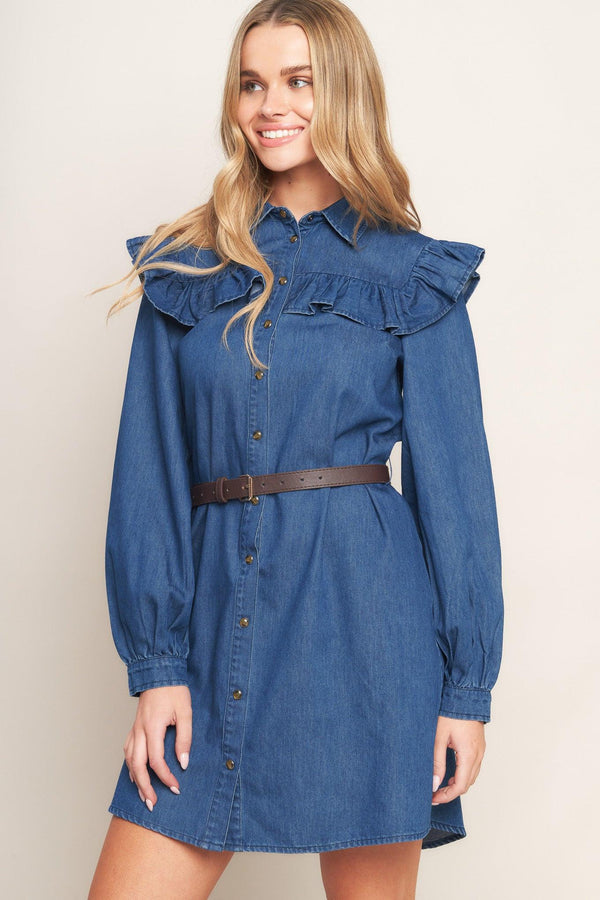 A denim mini dress featuring collar, square yoke with ruffles, long sleeve, front button down and contrasting belt