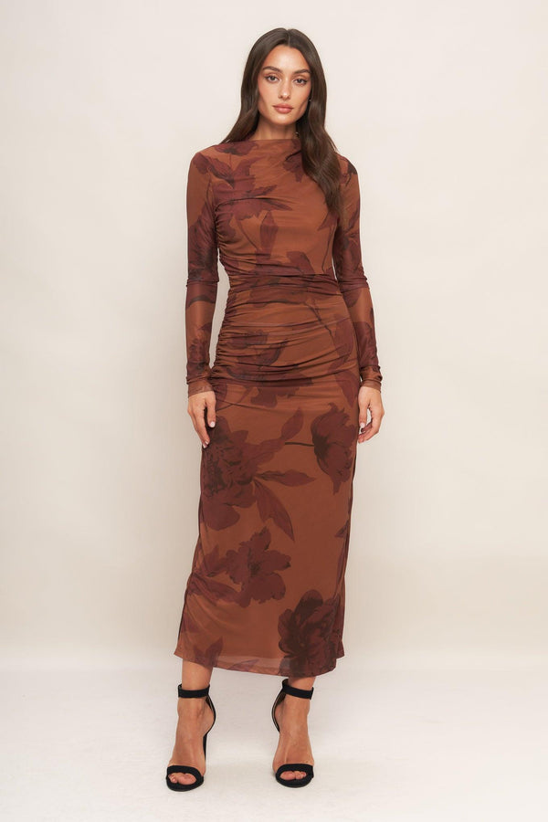 A printed power mesh midi dress featuring long sleeve, side shirring and back zipper closure
