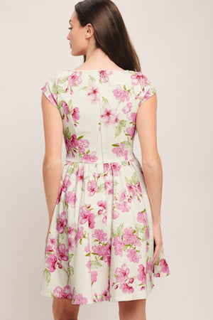 A printed woven mini dress featuring wide neckline, cap sleeve, side shirring, full skirt and back zipper closure

Details:

Self: 97% Cotton 3% Spandex

Size & Fit

-Model is 5`8" And Wearing Size Small
-Measurements Taken From Size Small
-Approx. Length: 35"