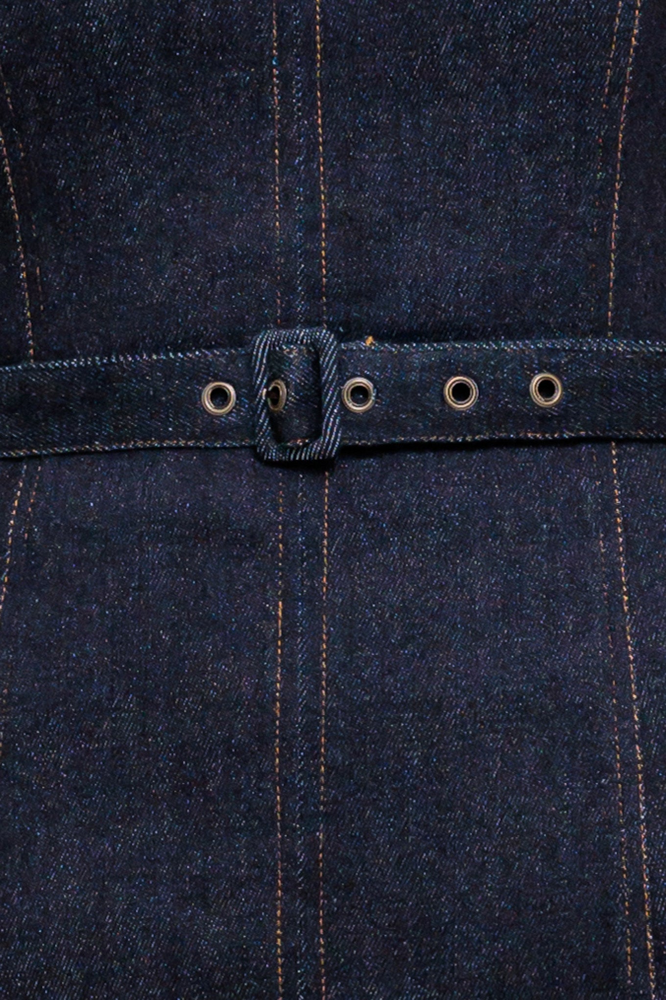 A dark indigo denim mini dress featuring round neckline, sleeveless, self belt and back zipper closure