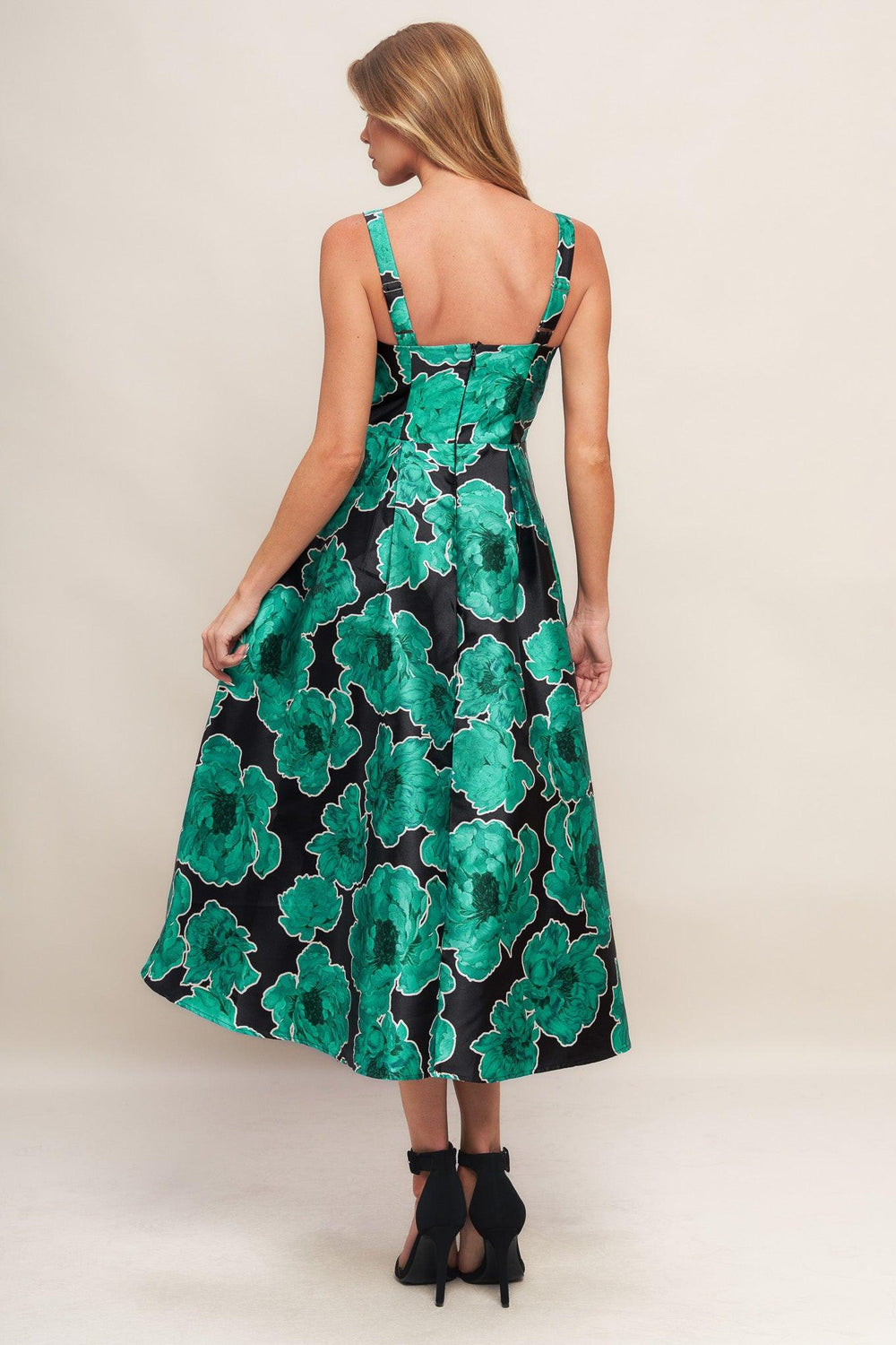 A printed woven midi dress featuring straight neckline, straps, full skirt and back zipper closure