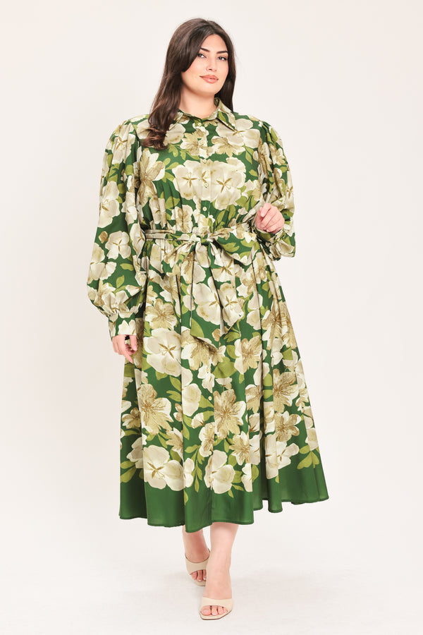 A woman wearing a long-sleeve midi dress with a green and cream floral print | Flying Tomato Curve