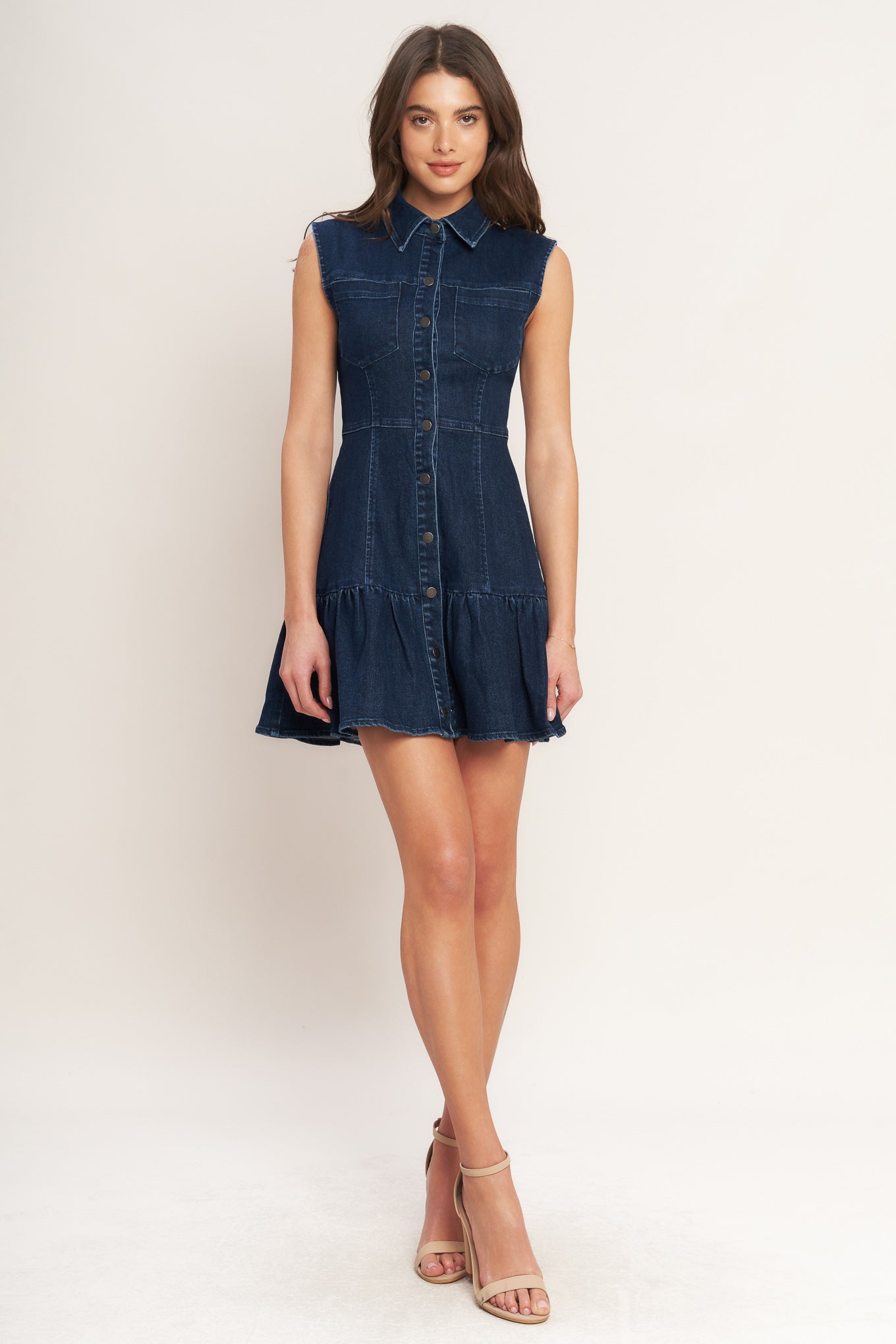
A washed denim mini dress featuring collar, sleeveless, front pocket, button down and ruffled hem

Details:

Self : 68% Cotton 30% Polyester 2% Spandex

Size &amp; Fit

- Model is 5`8" And Wearing Size Small
- Measurements Taken From Size Small
- Approx. Length: 34" FLYING TOMATO