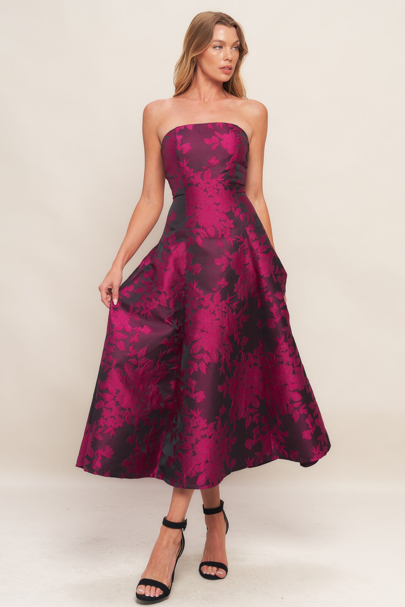 A woven jacquard midi dress featuring strapless, circle skirt and back zipper closure