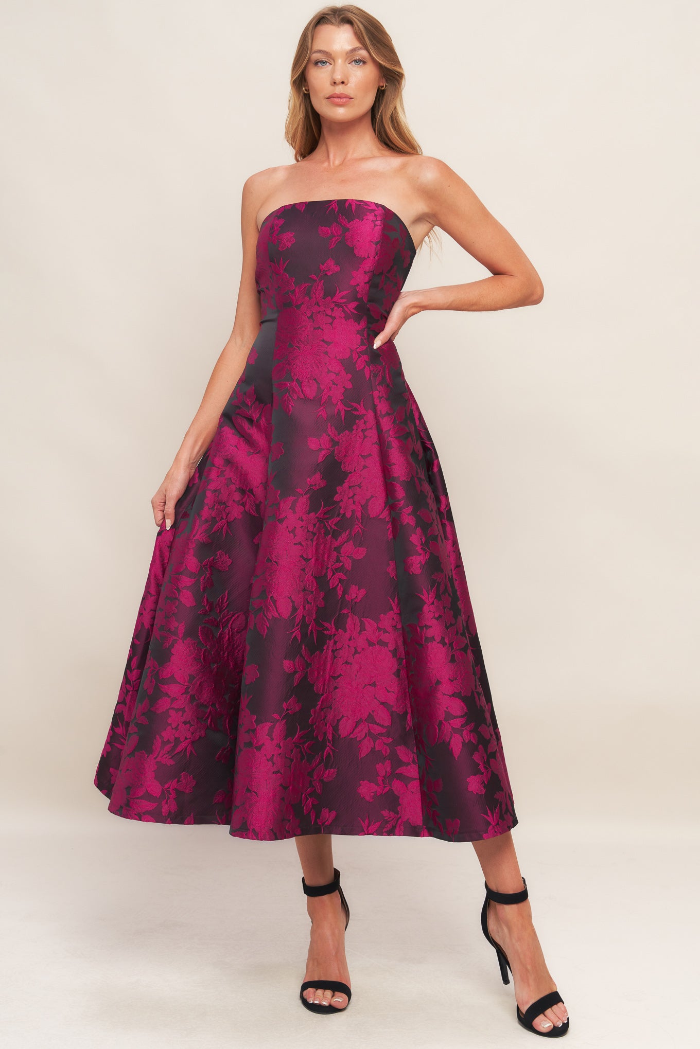 A woven jacquard midi dress featuring strapless, circle skirt and back zipper closure