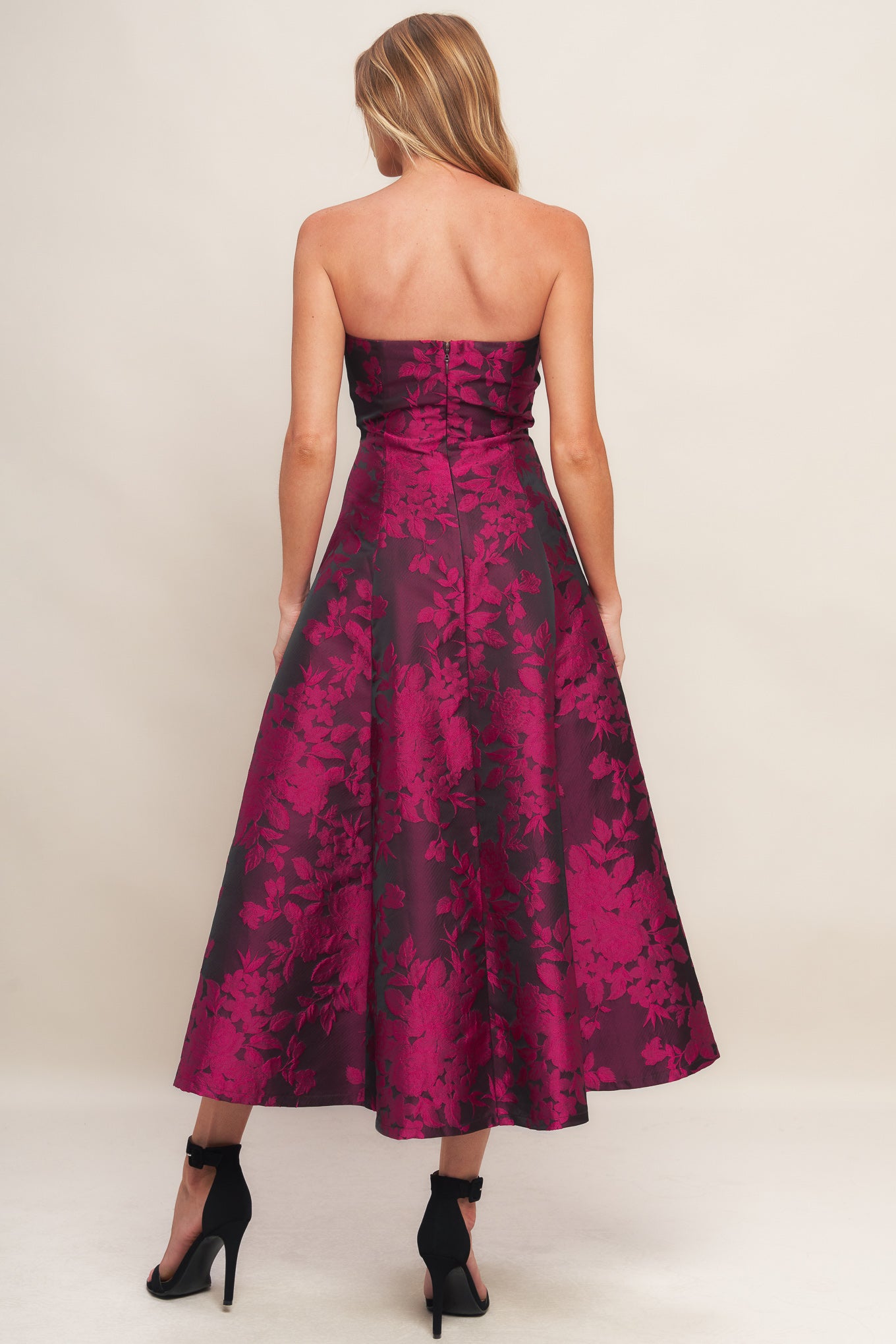 A woven jacquard midi dress featuring strapless, circle skirt and back zipper closure