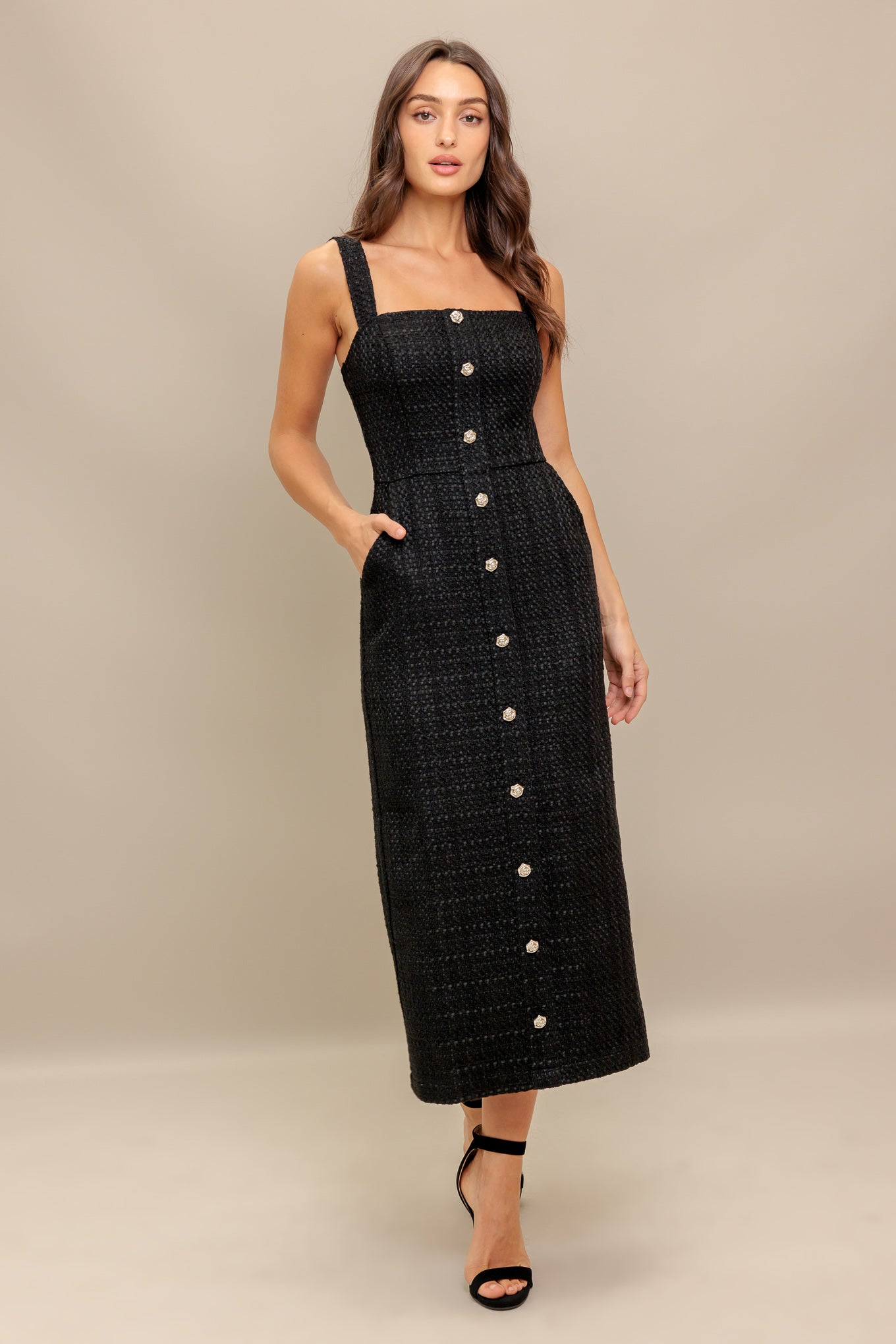 A solid woven tweed midi dress featuring straight neckline, straps, button down detail, pencil skirt and back zipper closure