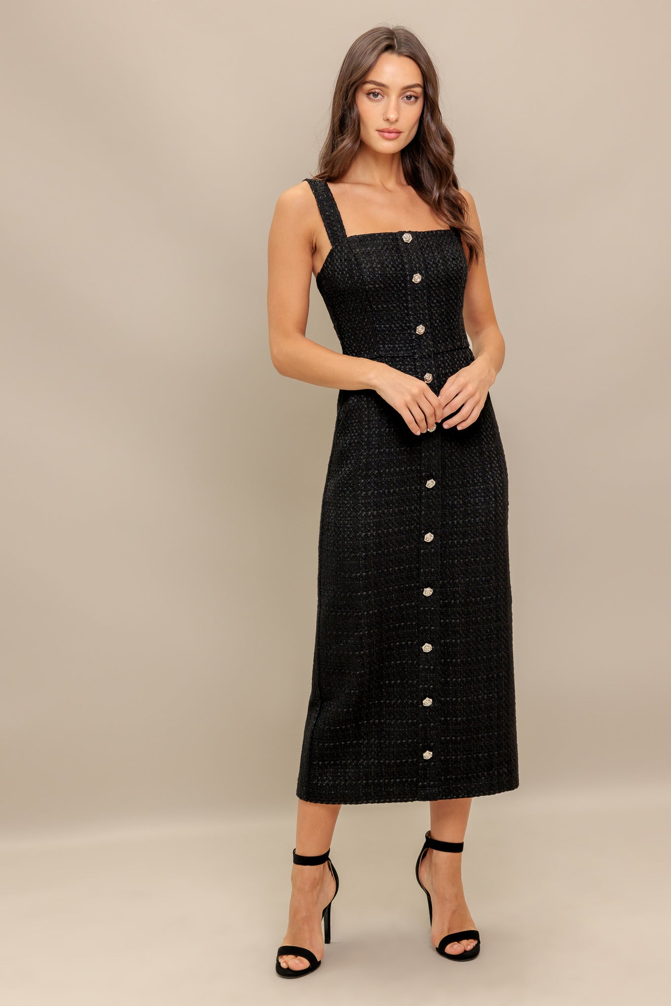A solid woven tweed midi dress featuring straight neckline, straps, button down detail, pencil skirt and back zipper closure