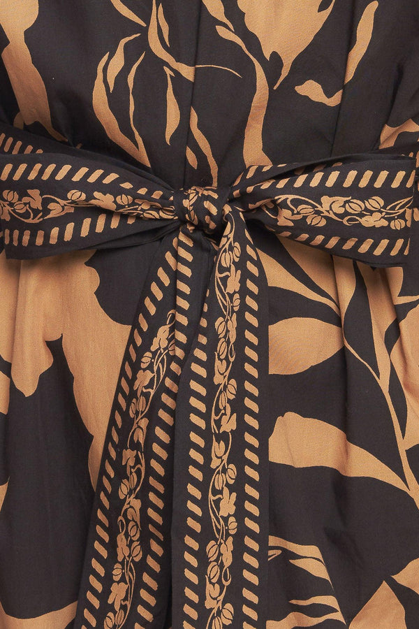 A printed woven midi dress featuring high neckline with V front, short puff sleeve and self sash tie