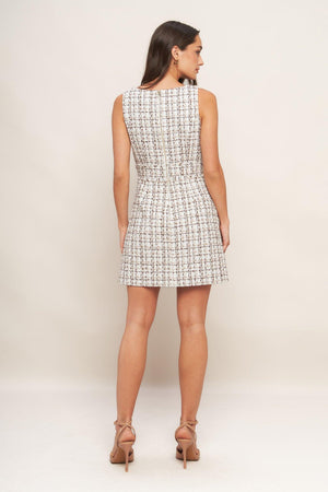 A tweed mini dress featuring straight neckline, sleeveless, front button detail and back zipper closure