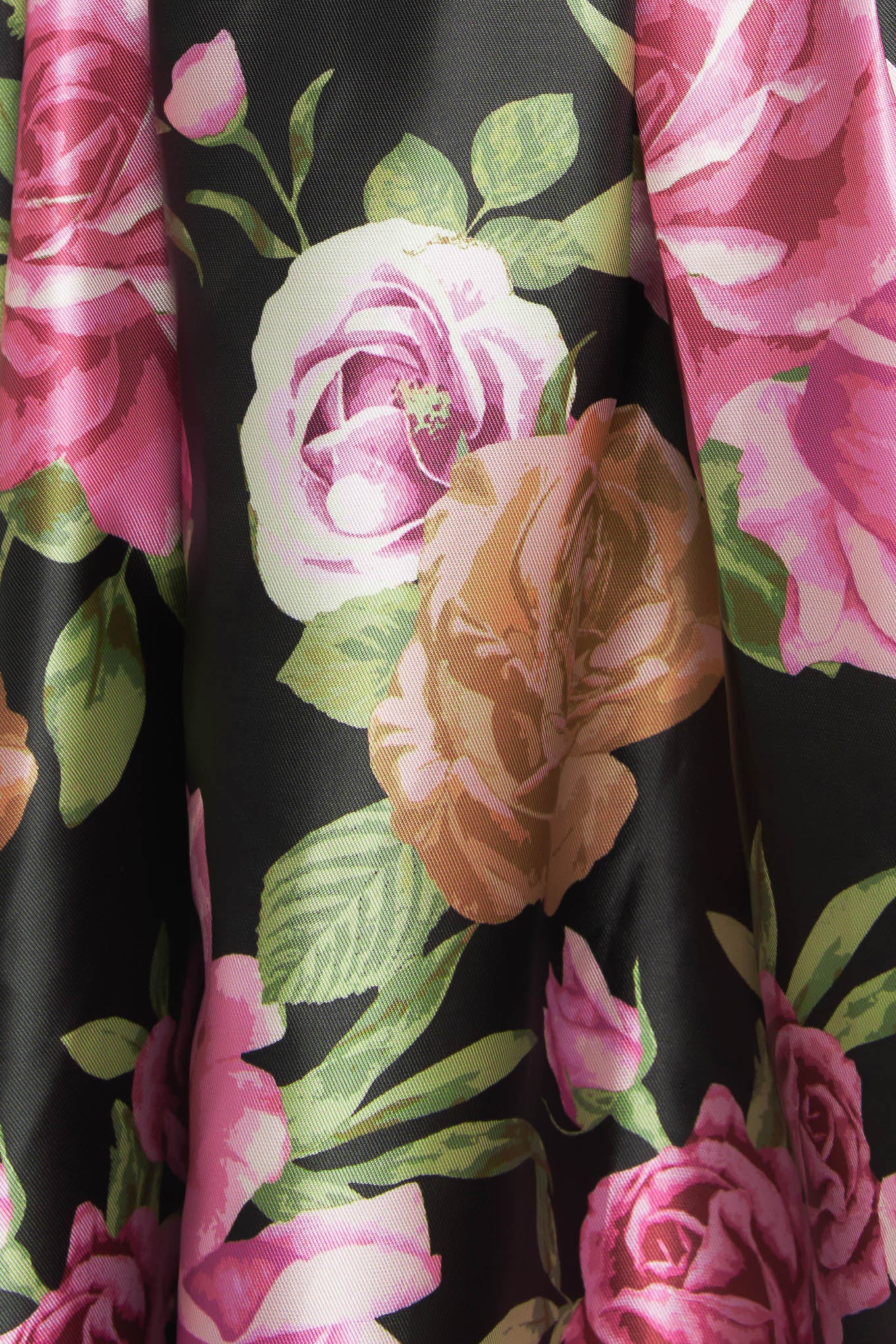 A printed woven maxi dress featuring strapless neckline, self belt, full skirt and back zipper closure