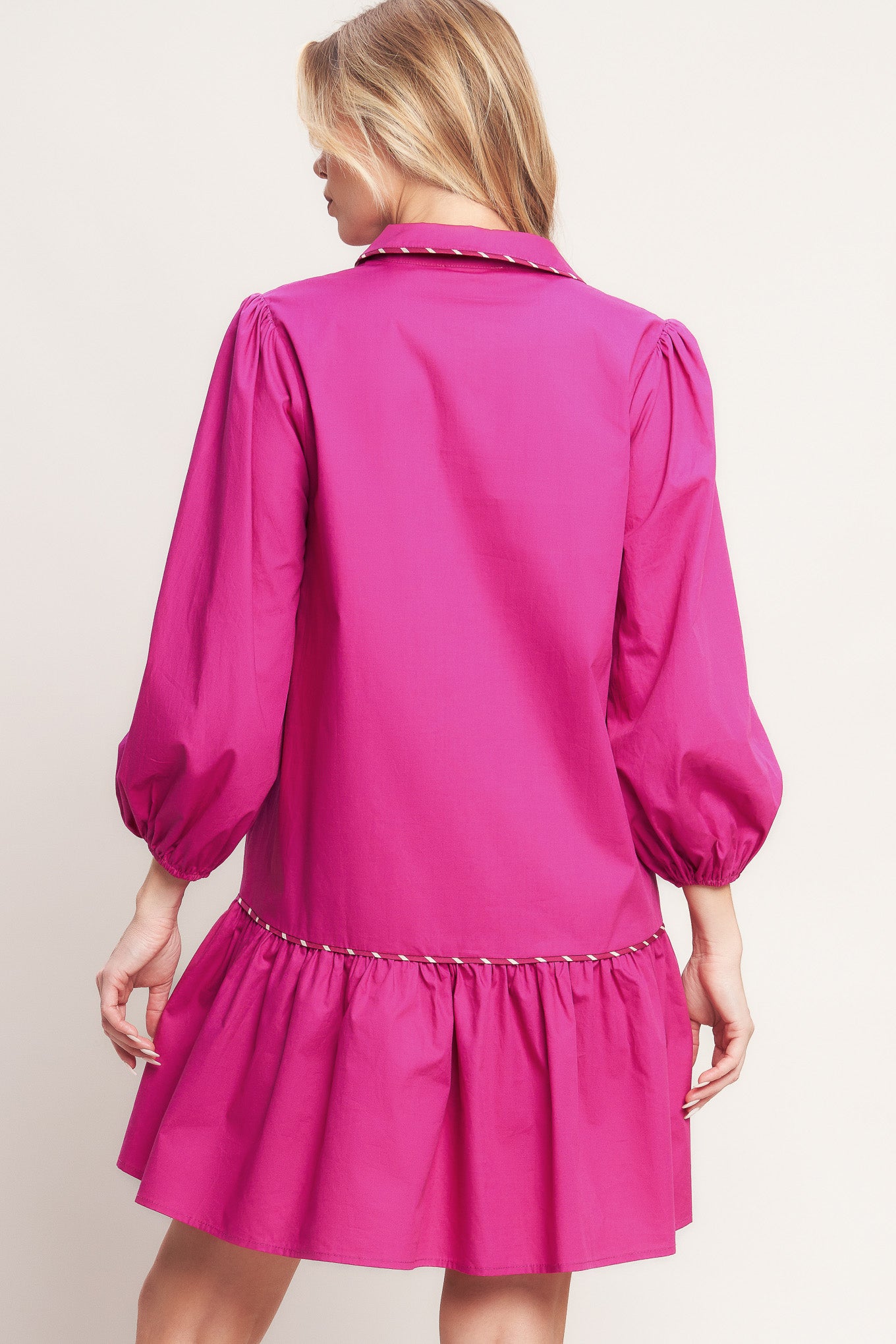 A solid woven mini dress featuring collar, V neck with button down, long sleeve and ruffled hem

Details:

Self: 100% Cotton

Size & Fit

-Model is 5`8" And Wearing Size Small
-Measurements Taken From Size Small
-Approx. Length: 36"