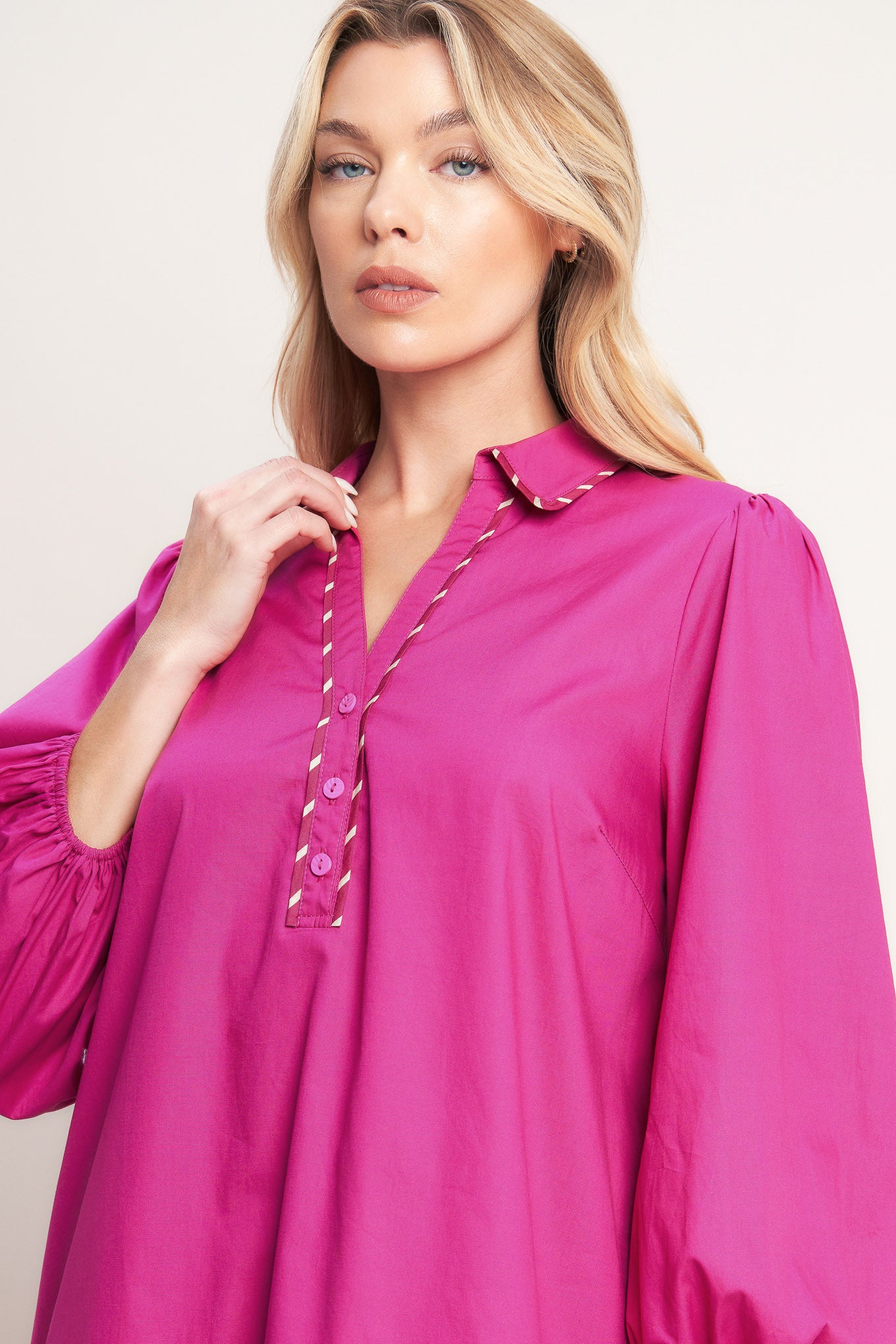 A solid woven mini dress featuring collar, V neck with button down, long sleeve and ruffled hem

Details:

Self: 100% Cotton

Size & Fit

-Model is 5`8" And Wearing Size Small
-Measurements Taken From Size Small
-Approx. Length: 36"