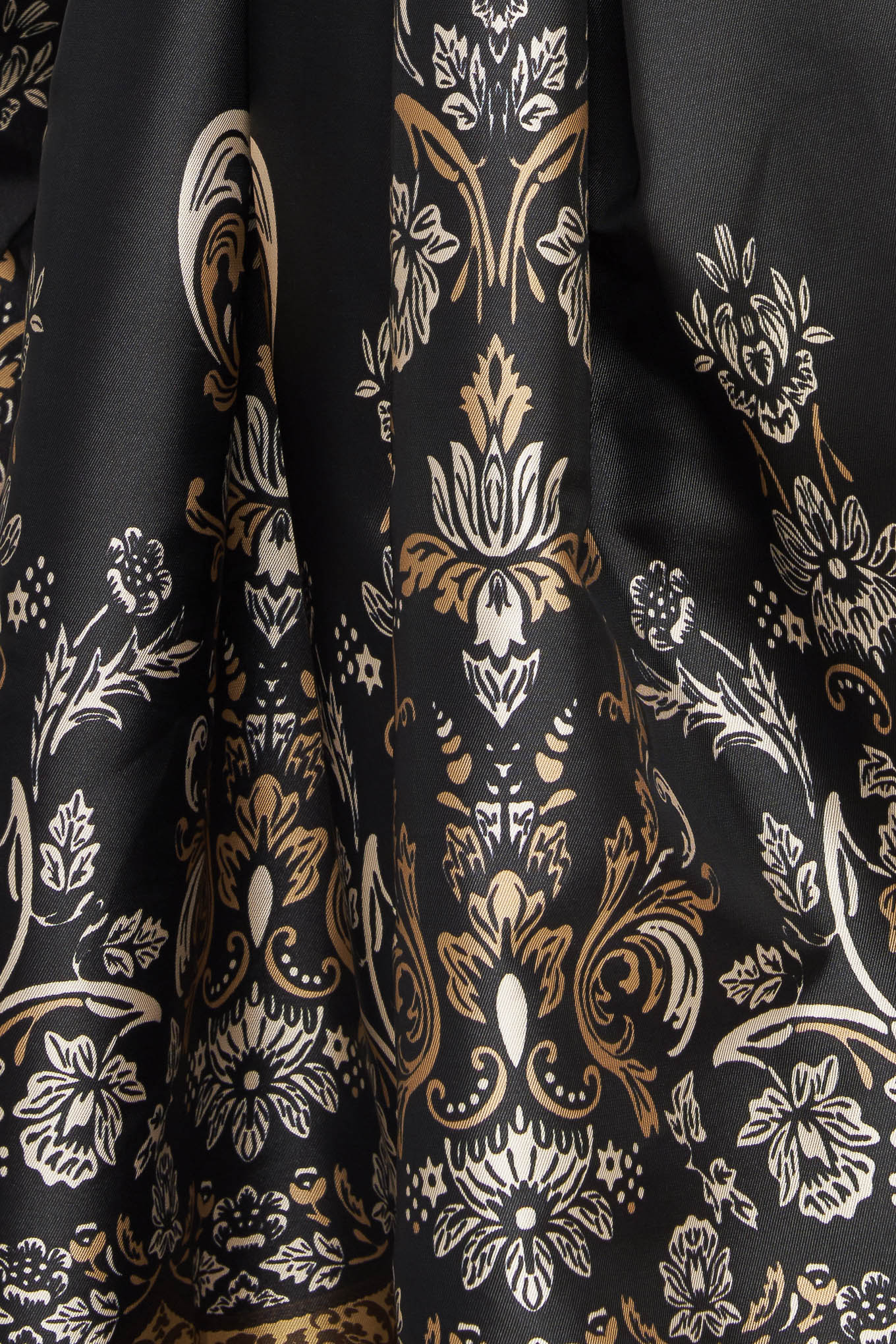 A printed woven midi dress featuring round neckline, sleeveless, full skirt and back zipper closure