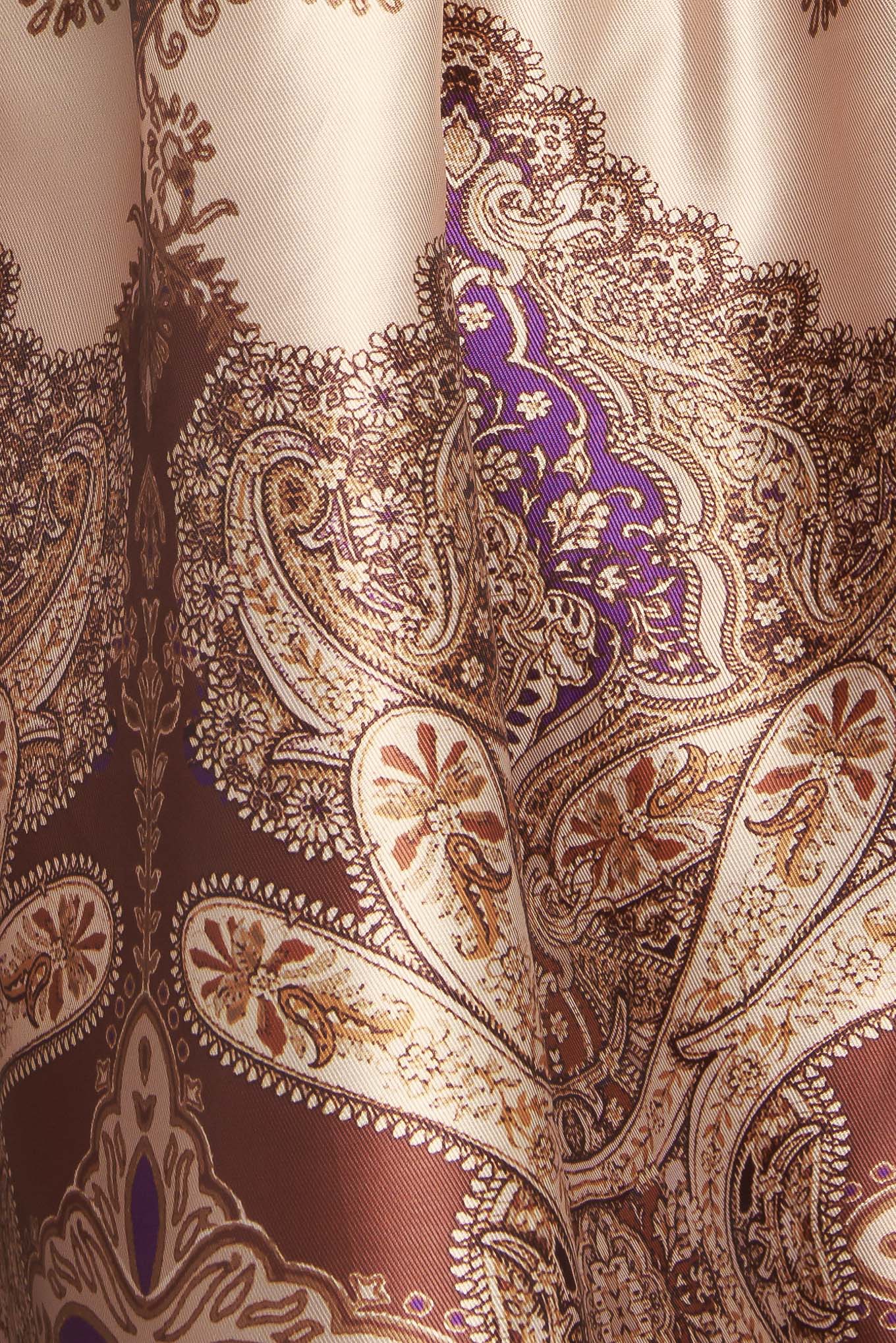 A printed woven maxi dress featuring straight neckline, shoulder tie, full skirt and smocked back bodice