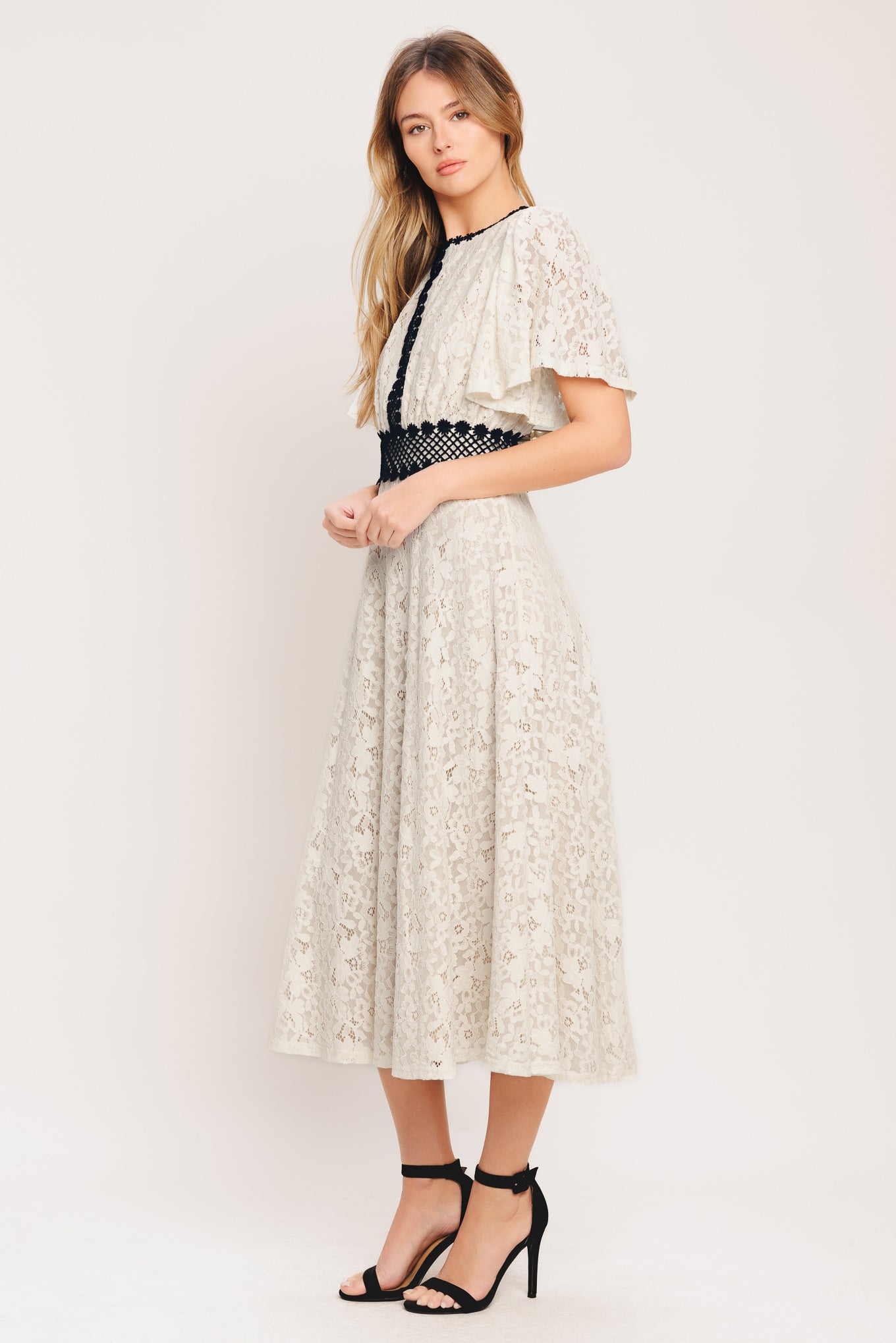A solid woven lace midi dress featuring round neckline, lace inset detail, circle skirt and back zipper closure

Details:

Self : 100% Polyester
Lining : 100% Polyester
Exclusive of Decoration

Size &amp; Fit

- Model is 5`8" And Wearing Size Small
- Measurements Taken From Size Small
- Approx. Length: 53"