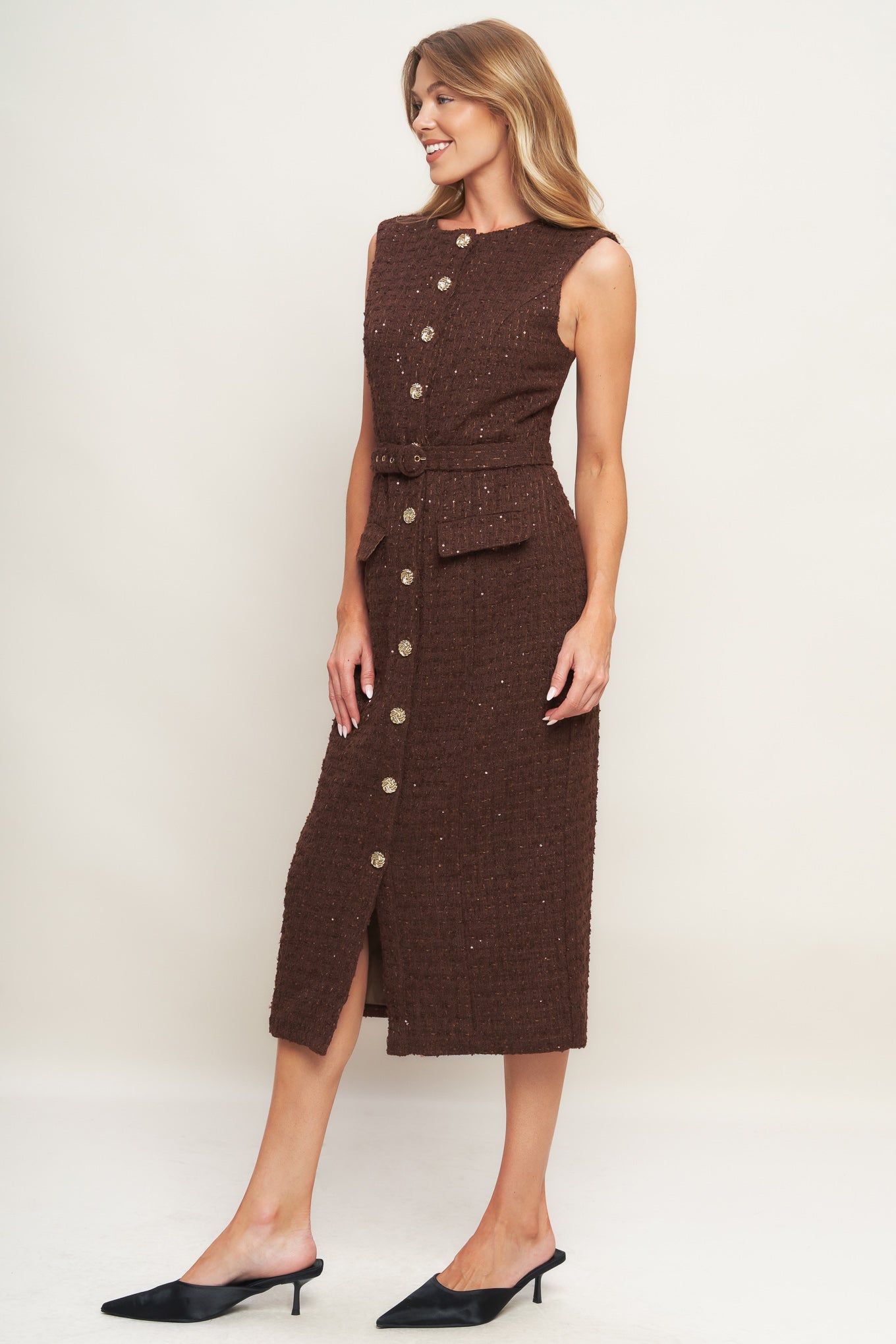 A tweed midi dress featuring round neckline, sleeveless, front button down and self belt
