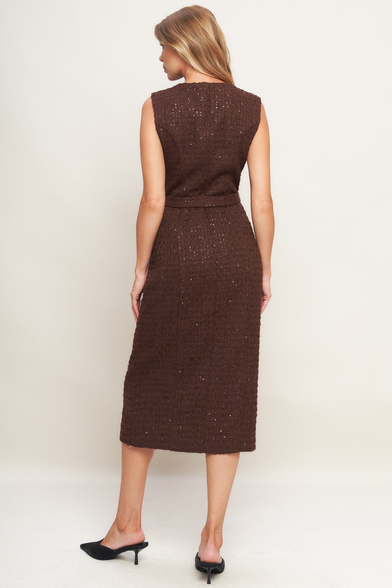 A tweed midi dress featuring round neckline, sleeveless, front button down and self belt