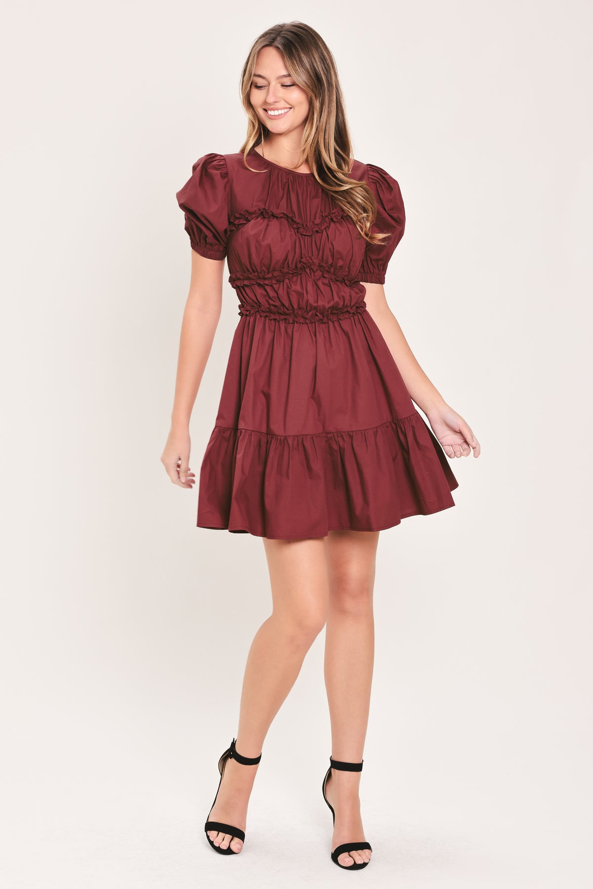 Woman wearing a maroon short puff sleeve mini dress | Flying Tomato