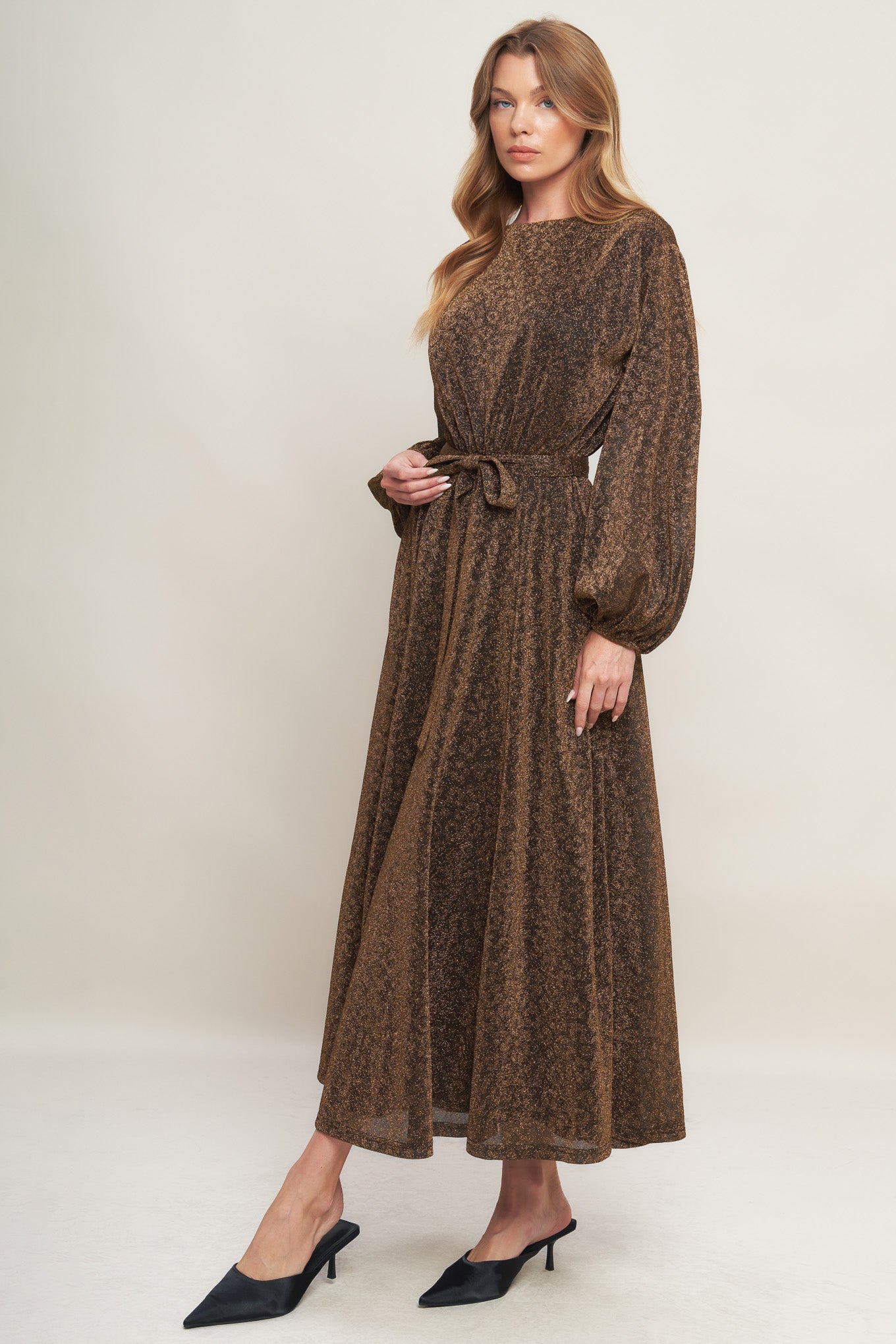A metallic threaded woven midi dress featuring wide neckline, long blouson sleeve, self sash tie and back zipper closure