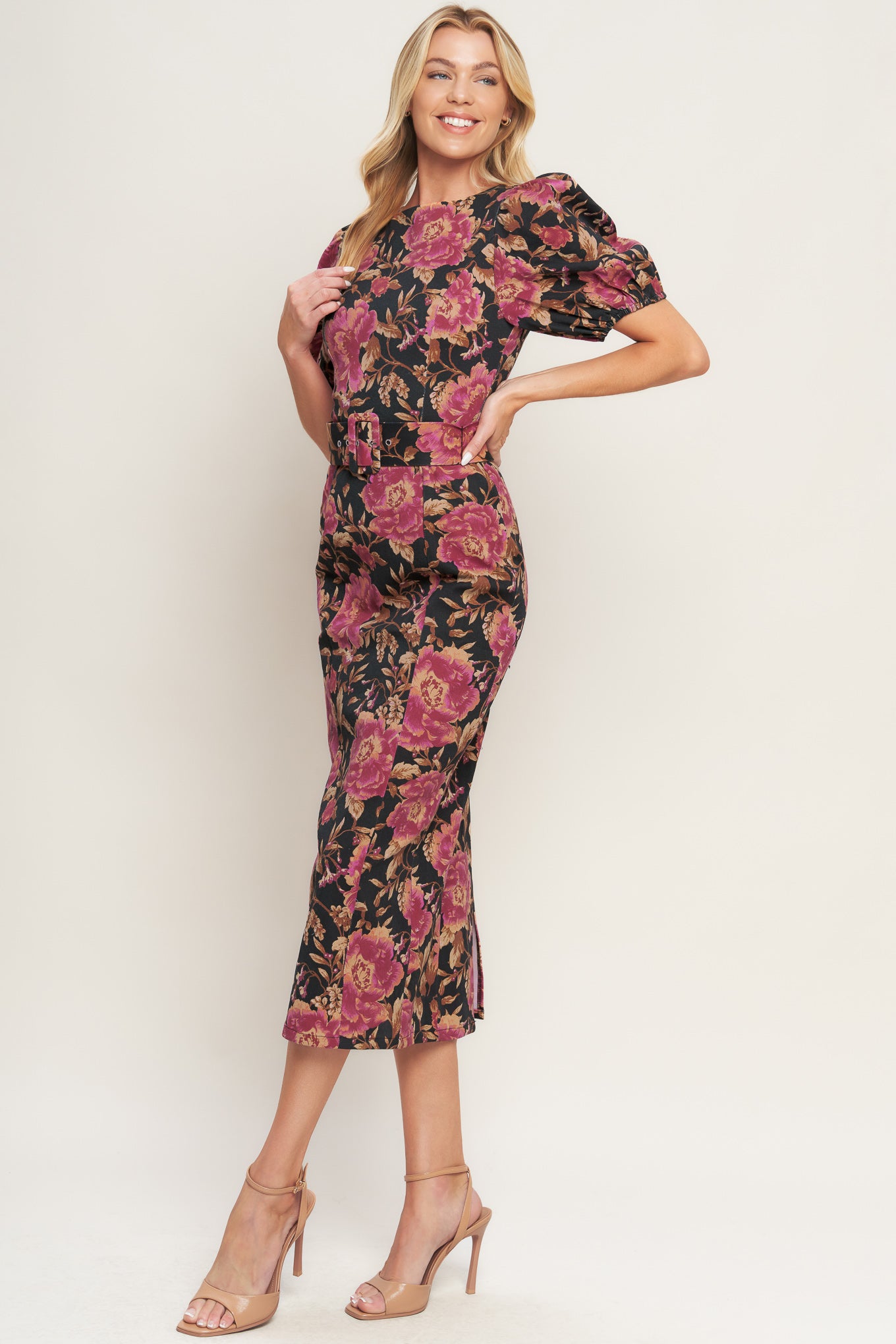 A printed woven midi dress featuring wide neckline, short puff sleeve, self belt, pencil skirt and back zipper closure
