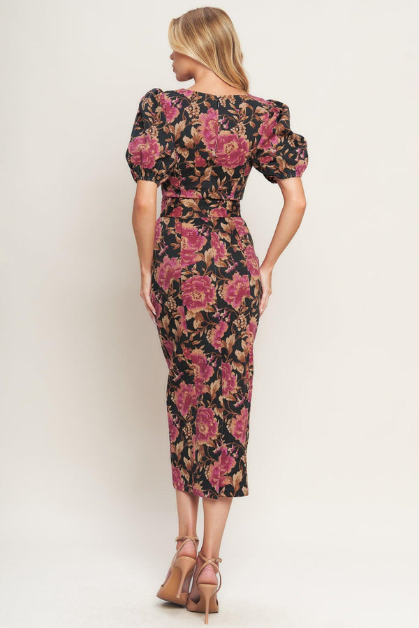 A printed woven midi dress featuring wide neckline, short puff sleeve, self belt, pencil skirt and back zipper closure