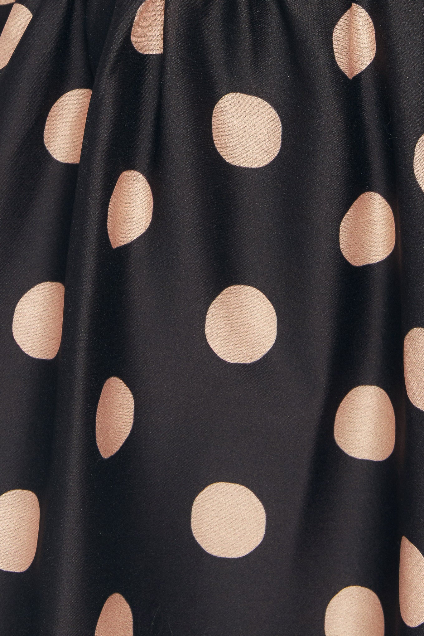 A printed woven midi dress featuring strapless, side shirred bodice, drop waistline, full skirt and smocked back bodice