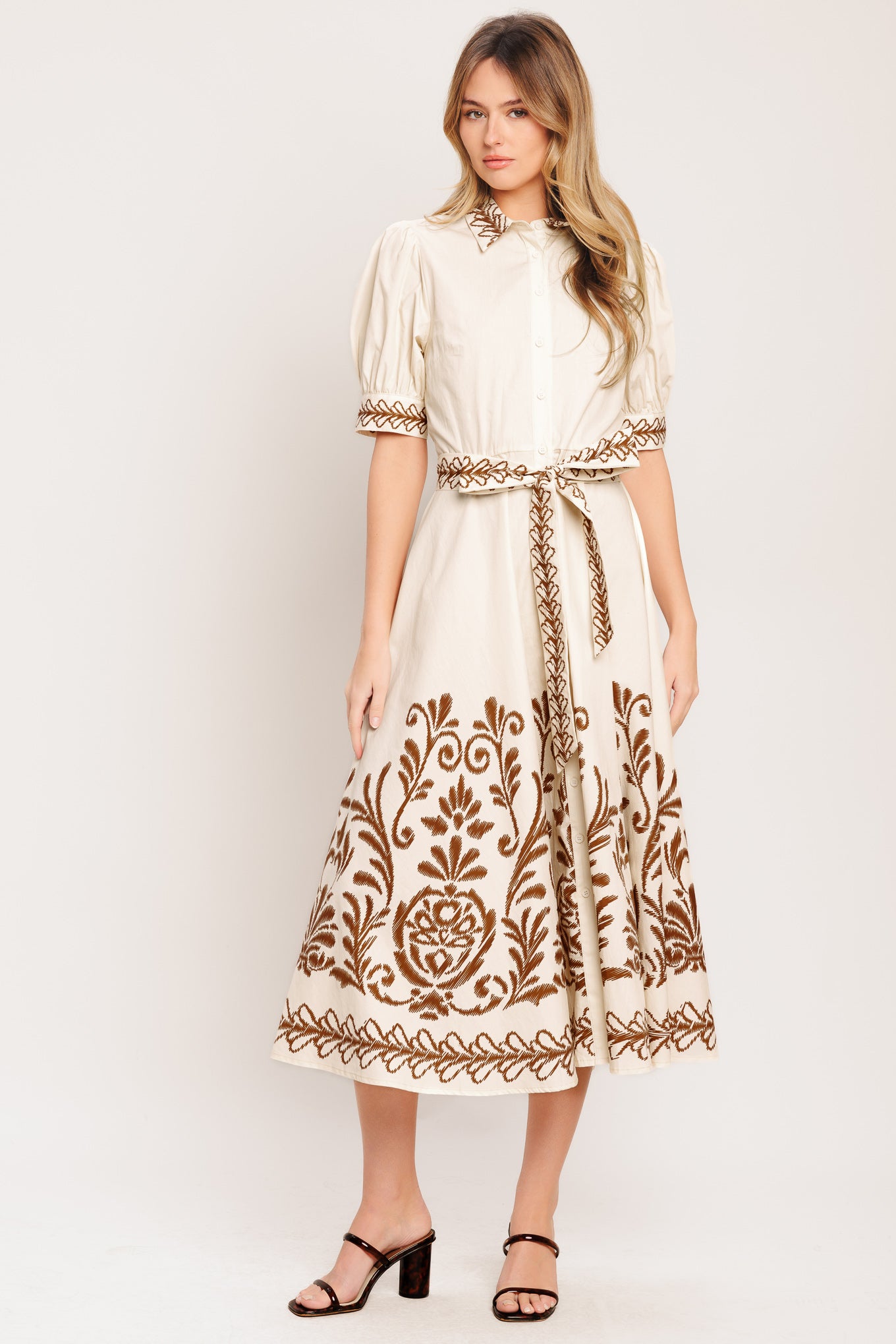 A printed woven midi dress featuring collar, long sleeve with cuff, front button down, self sash tie and full skirt

Details:

Self: 100% Cotton

Size & Fit

-Model is 5`8" And Wearing Size Small
-Measurements Taken From Size Small
-Approx. Length: 51"