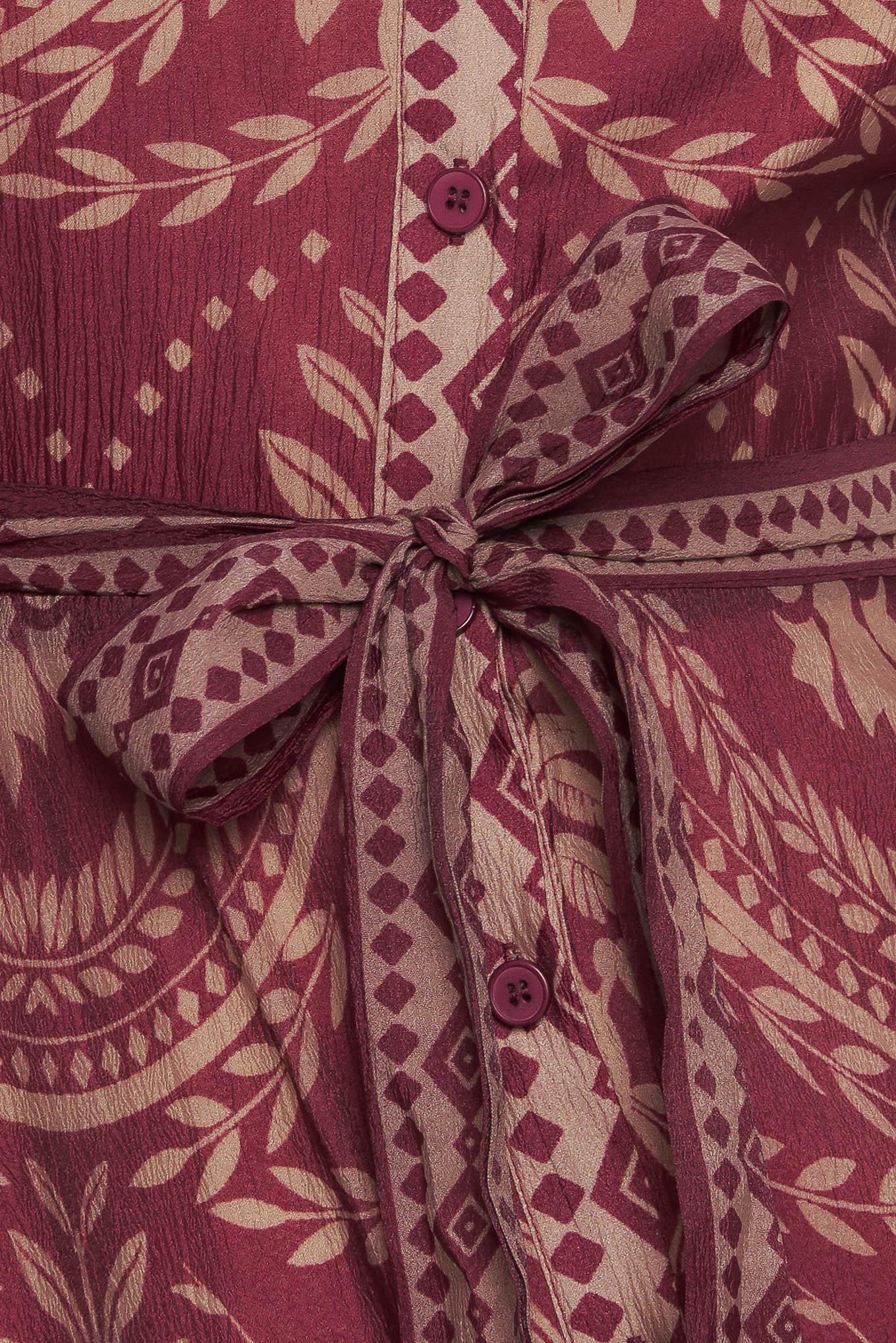 A printed woven midi dress featuring collar, front button down closure, long sleeve with circle skirt