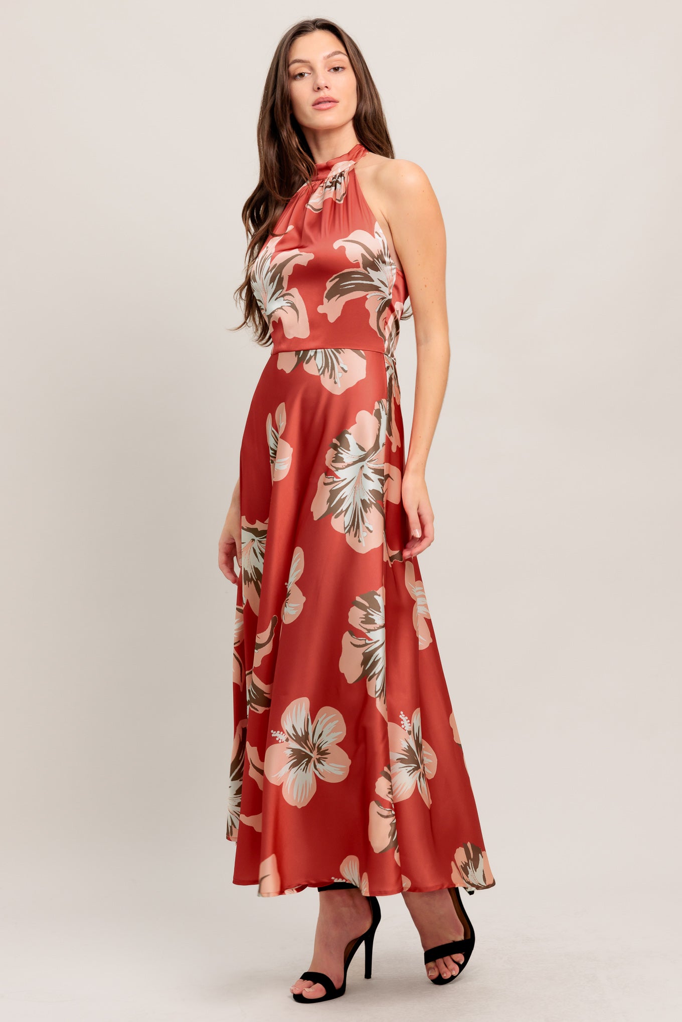 
A printed woven midi dress featuring halter neckline with back tie, circle skirt, bare back with elastic and side zipper closure

Details:

Self : 100% Polyester
Lining : 100% Polyester

Size &amp; Fit

- Model is 5`8" And Wearing Size Small
- Measurements Taken From Size Small
- Approx. Length: 54" Flying Tomato