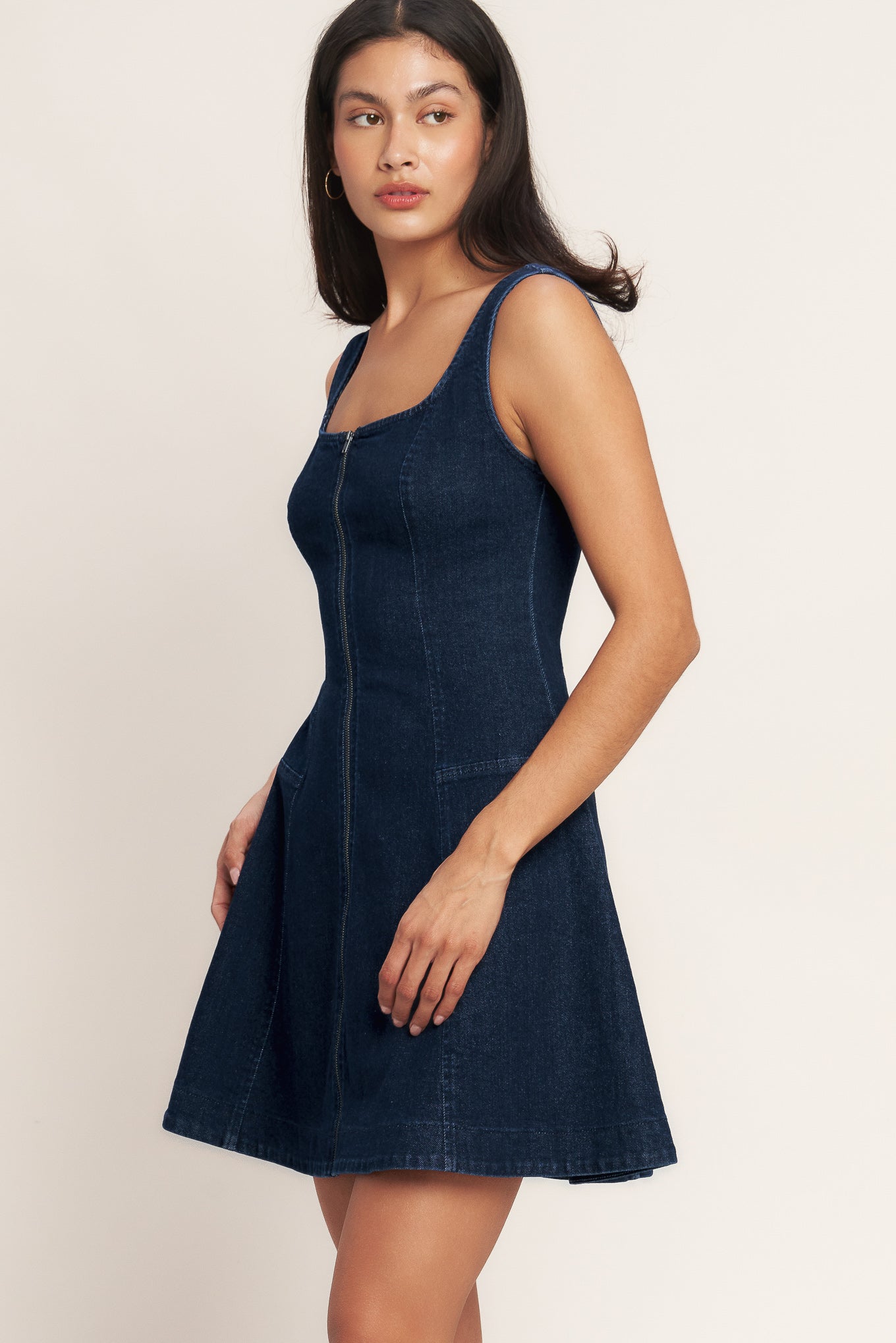 
A washed denim mini dress featuring square neckline, sleeveless, front zipper closure and circle skirt

Details:

Self : 98% Cotton 2% Spandex

Size &amp; Fit

- Model is 5`8" And Wearing Size Small
- Measurements Taken From Size Small
- Approx. Length: 34" FLYING TOMATO