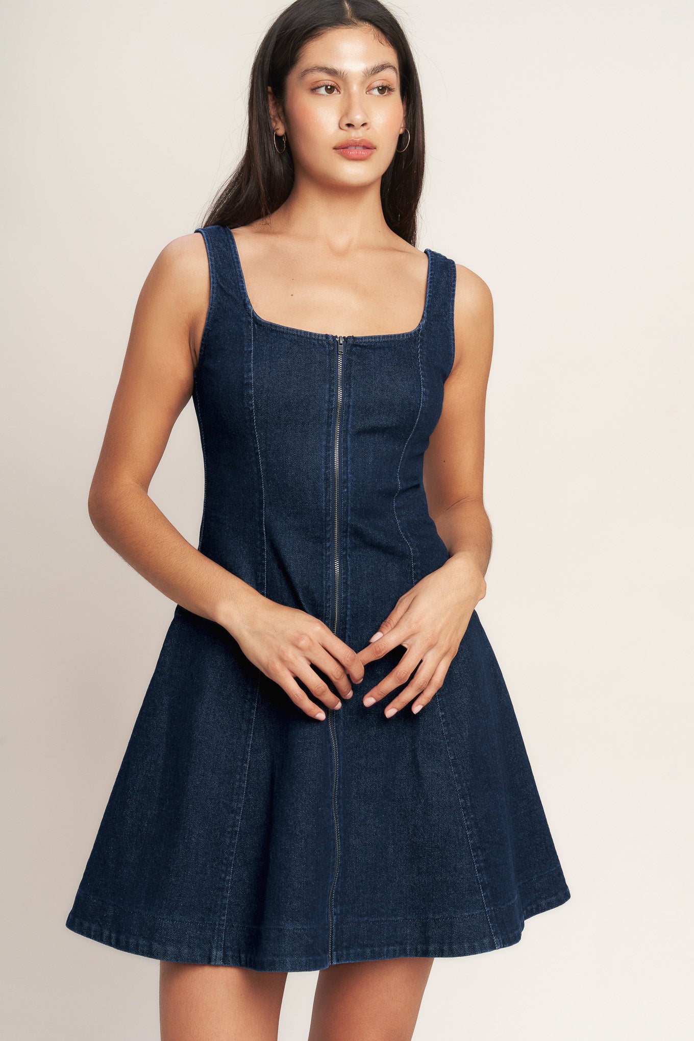 
A washed denim mini dress featuring square neckline, sleeveless, front zipper closure and circle skirt

Details:

Self : 98% Cotton 2% Spandex

Size &amp; Fit

- Model is 5`8" And Wearing Size Small
- Measurements Taken From Size Small
- Approx. Length: 34" FLYING TOMATO