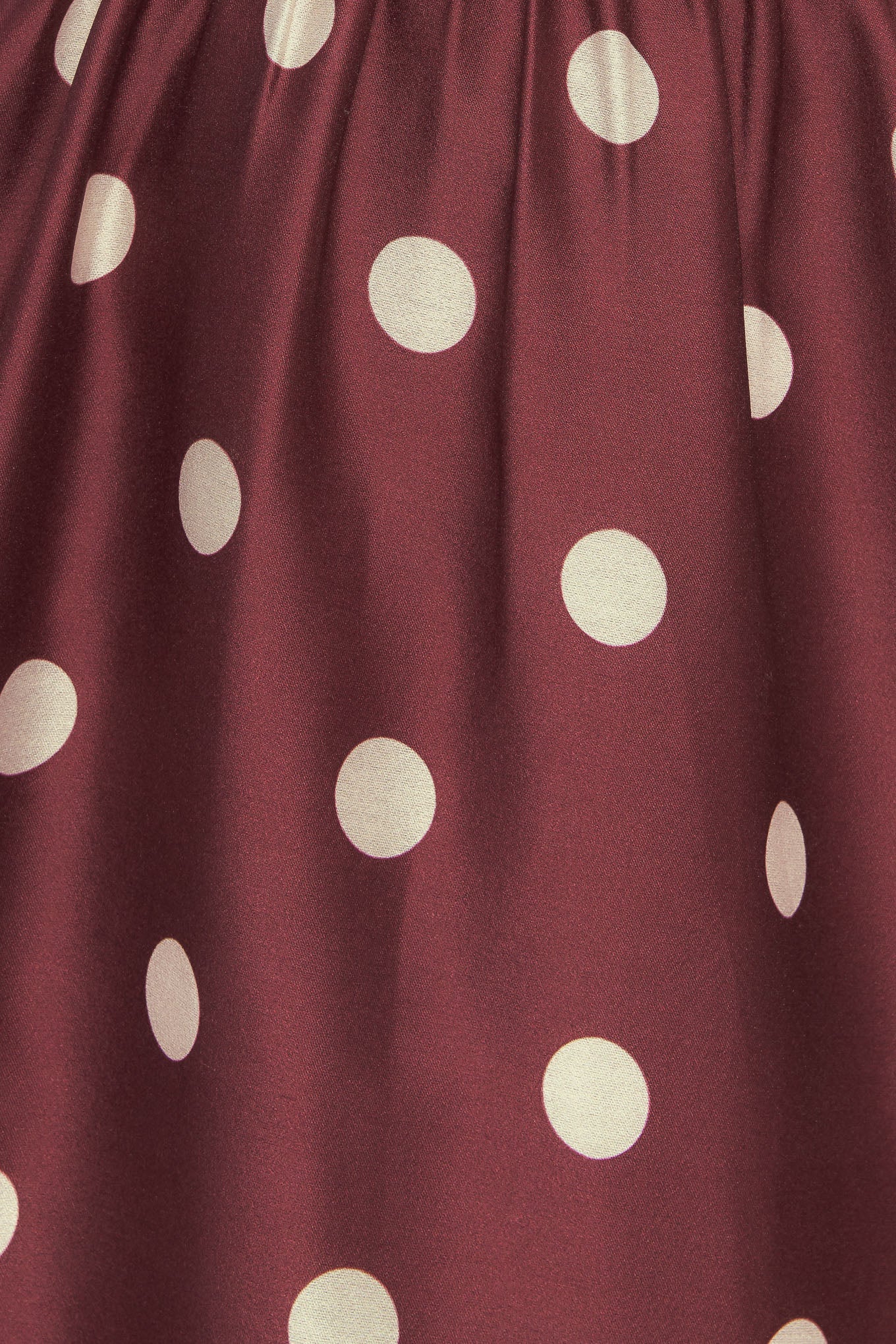 A printed woven midi dress featuring straight neckline, straps, shirred bodice, wide waist band, full skirt and back zipper closure
