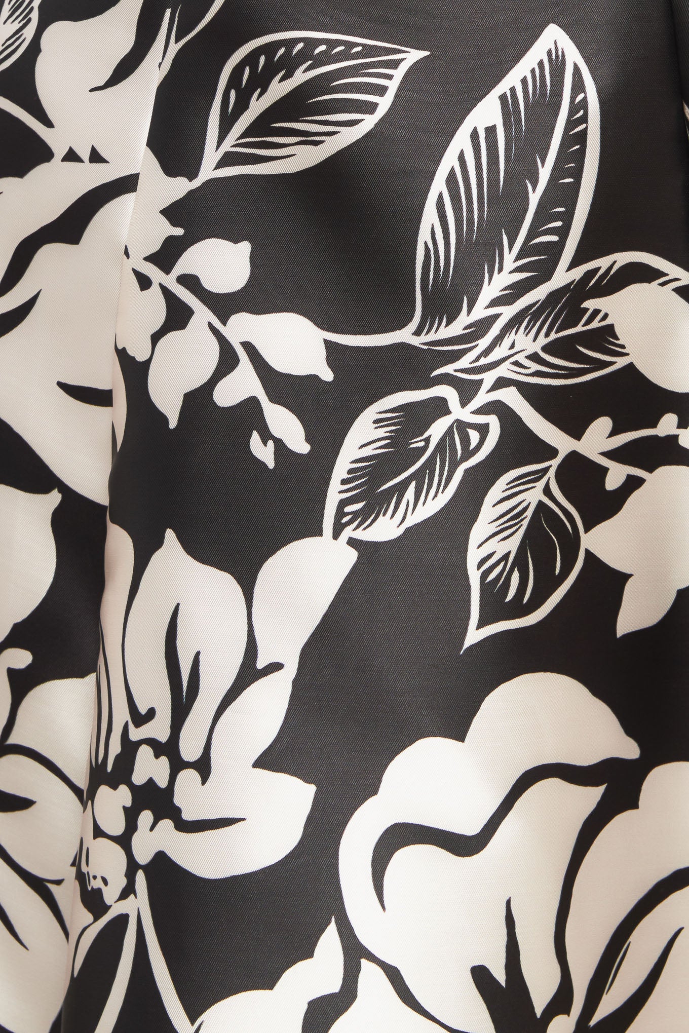 A printed woven midi dress featuring straight neckline, circle skirt and back zipper closure
