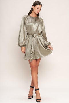 A foiled woven mini dress featuring round neckline, long sleeve, self sash tie and back neck button closure