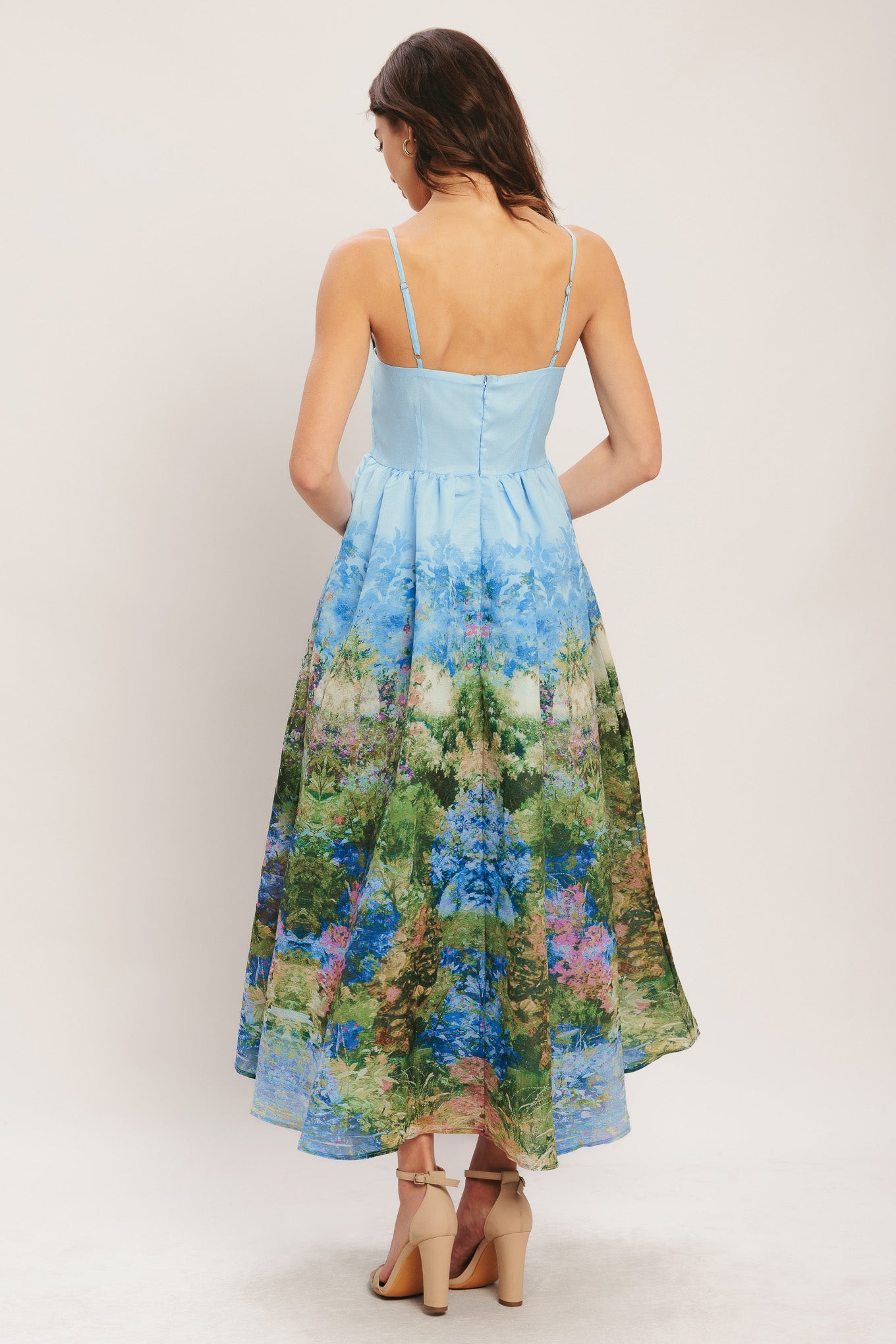 
A printed woven midi dress featuring straight neckline, straps, full skirt and back zipper closure

Details:

Self : 100% Polyester
Lining : 100% Polyester

Size &amp; Fit

- Model is 5`8" And Wearing Size Small
- Measurements Taken From Size Small
- Approx. Length: 53"