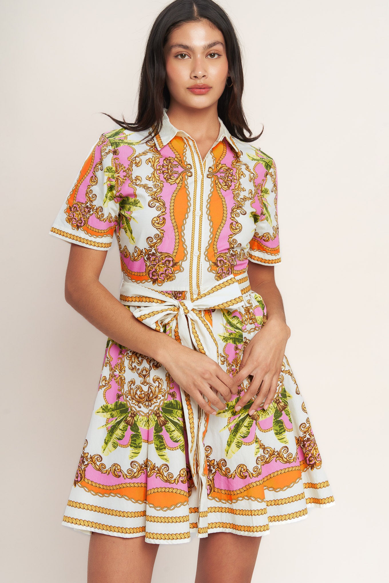 
A printed woven mini shirt dress featuring collar, short sleeve, button down and self sash tie

Details:

Self : 100% Cotton

Size &amp; Fit

- Model is 5`8" And Wearing Size Small
- Measurements Taken From Size Small
- Approx. Length: 36" Flying Tomato