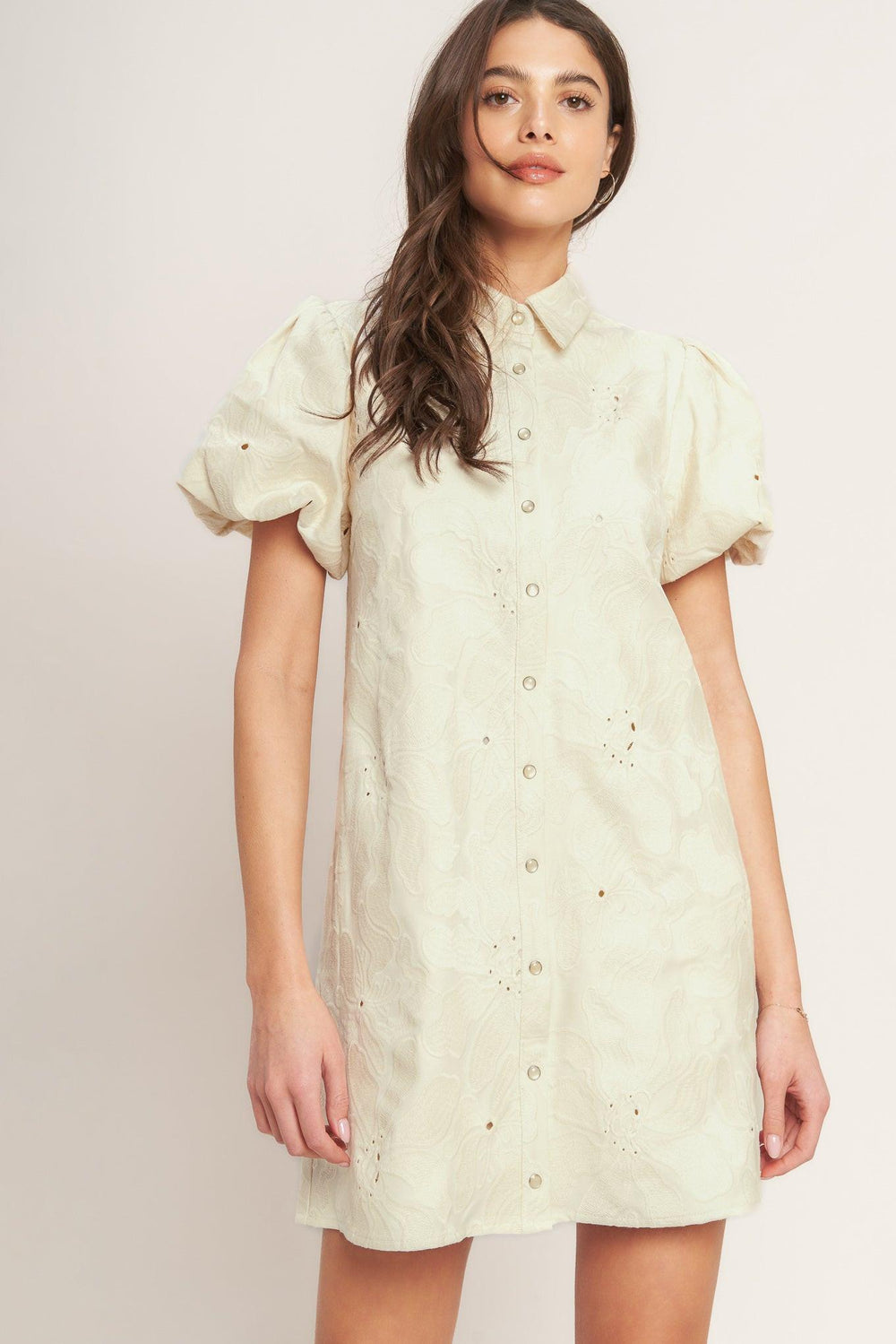 
A textured woven mini dress featuring collar, short puff short and front button down closure

Details:

Self : 100% Cotton
Lining : 100% Polyester

Size &amp; Fit

- Model is 5`8" And Wearing Size Small
- Measurements Taken From Size Small
- Approx. Length: 35" FLYING TOMATO