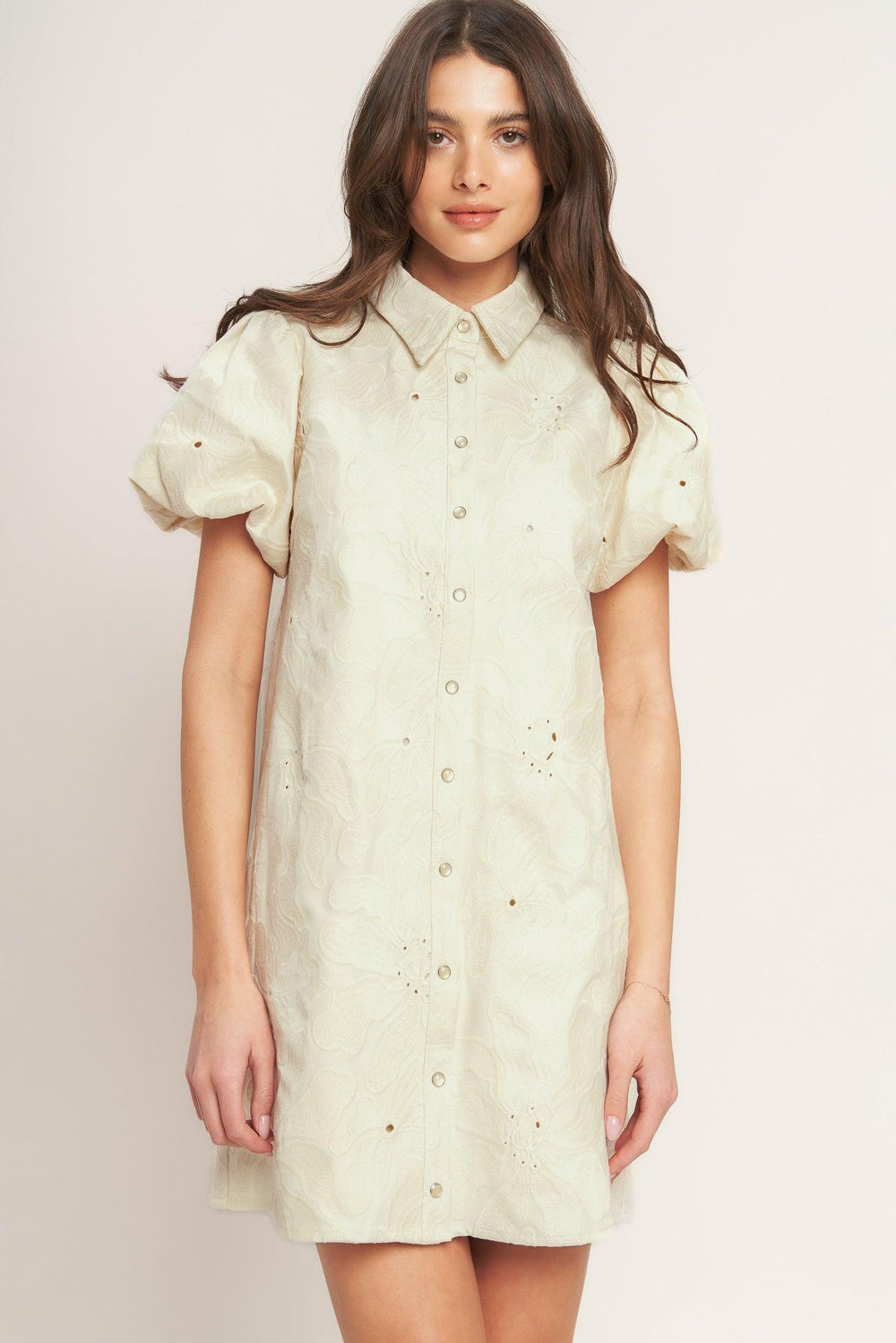 
A textured woven mini dress featuring collar, short puff short and front button down closure

Details:

Self : 100% Cotton
Lining : 100% Polyester

Size &amp; Fit

- Model is 5`8" And Wearing Size Small
- Measurements Taken From Size Small
- Approx. Length: 35" FLYING TOMATO