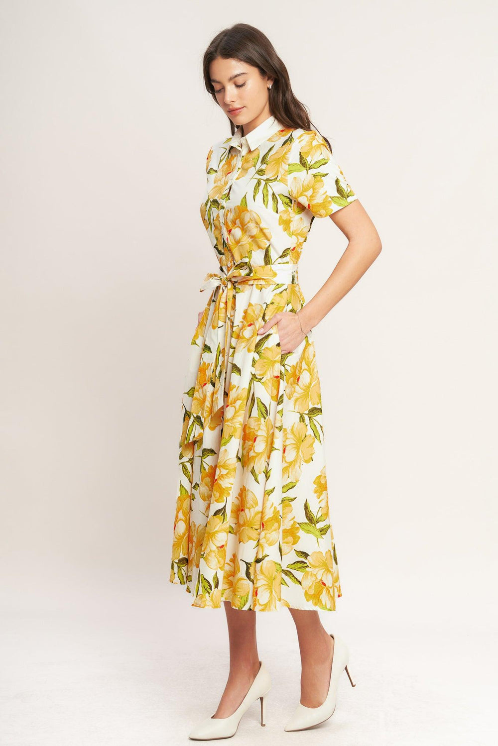 
A printed woven midi dress featuring collar, short sleeve, button down, self sash tie and circle skirt

Details:

Self : 100% Cotton

Size &amp; Fit

- Model is 5`8" And Wearing Size Small
- Measurements Taken From Size Small
- Approx. Length: 50" Flying Tomato