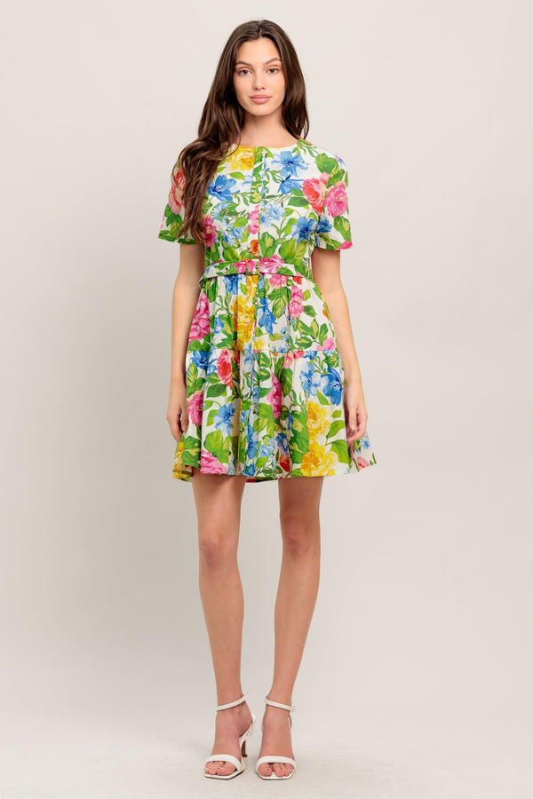 
A printed woven mini dress featuring round neckline, short sleeve, hidden placket, self belt and ruffle hem

Details:

Self : 100% Cotton

Size &amp; Fit

- Model is 5`8" And Wearing Size Small
- Measurements Taken From Size Small
- Approx. Length: 35" Flying Tomato